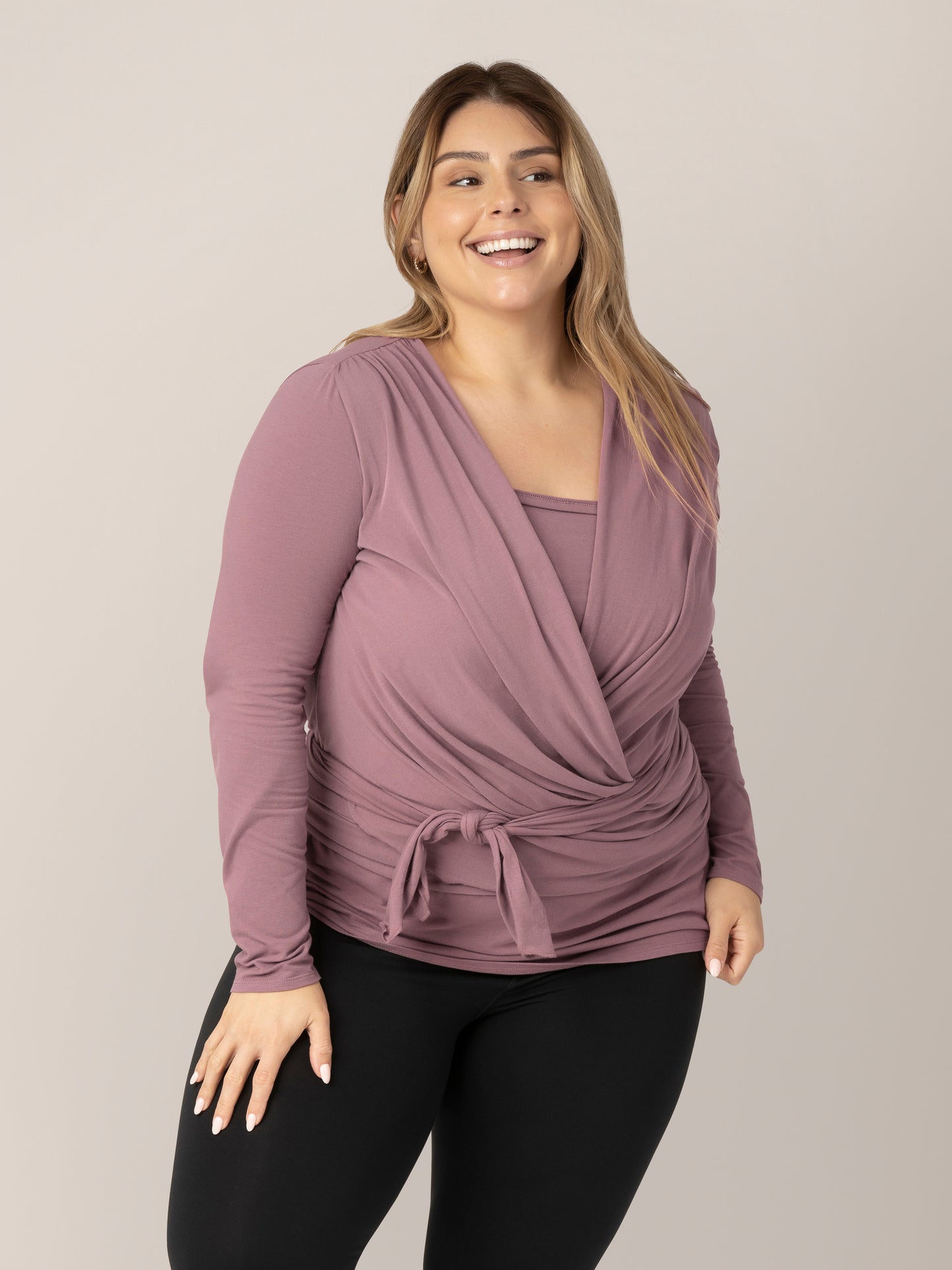 Front view of model wearing the Organic Cotton Skin to Skin Long Sleeve Wrap Top in Twilight.