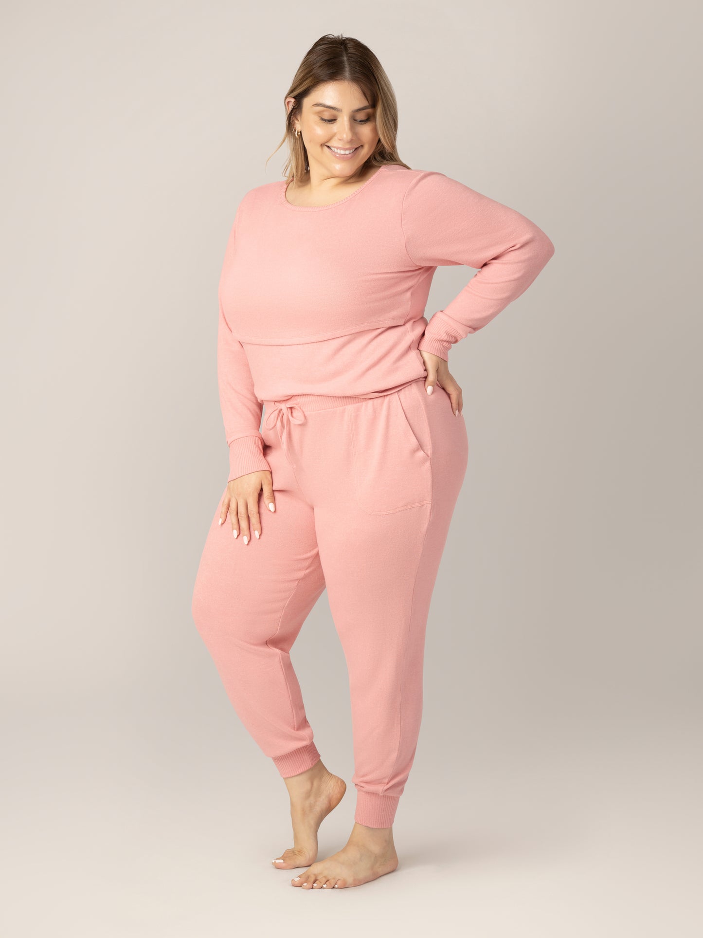 3/4 front view of model wearing the Zoe Nursing Pajama & Lounge Set in Rose Heather, with one hand on hip @model_info:Vanessa is 5'8" and wearing an X-Large.