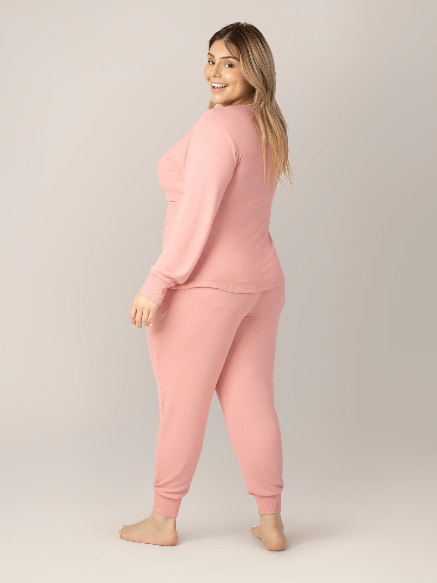 Side back view of model wearing the Zoe Nursing Pajama & Lounge Set in Rose Heather