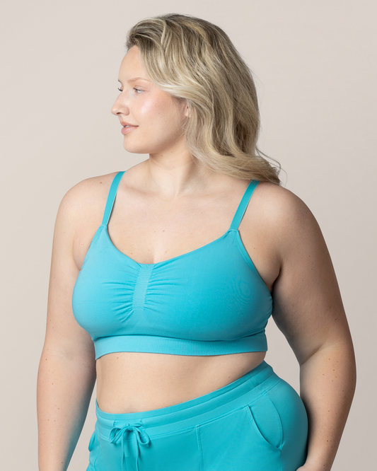 Side view of model wearing the Sublime® Bamboo Hands-Free Pumping Lounge & Sleep Bra in Aquamarine with matching Bamboo Maternity & Postpartum Lounge Short @model_info:Austen is wearing an X-Large Busty.