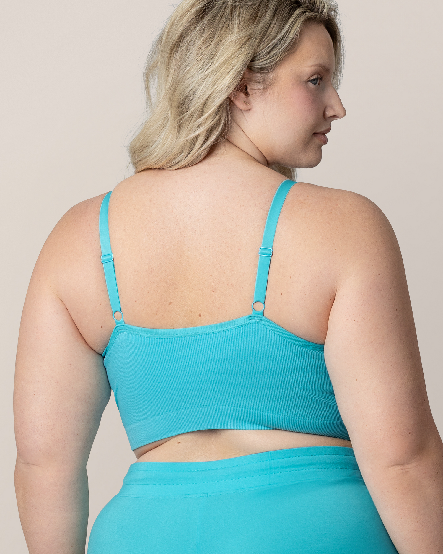 Back view of model wearing the Sublime® Bamboo Hands-Free Pumping Lounge & Sleep Bra in Aquamarine with matching Bamboo Maternity & Postpartum Lounge Short 