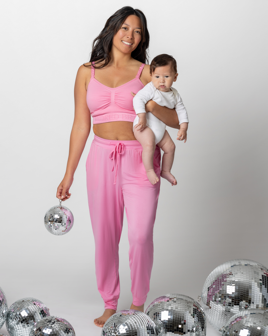 Front view of model wearing Everyday Lounge Jogger in Bubblegum with matching Sublime® Hands-Free Pumping & Nursing Bra @model_info:Hillary is 5'2"and wearing a Small.