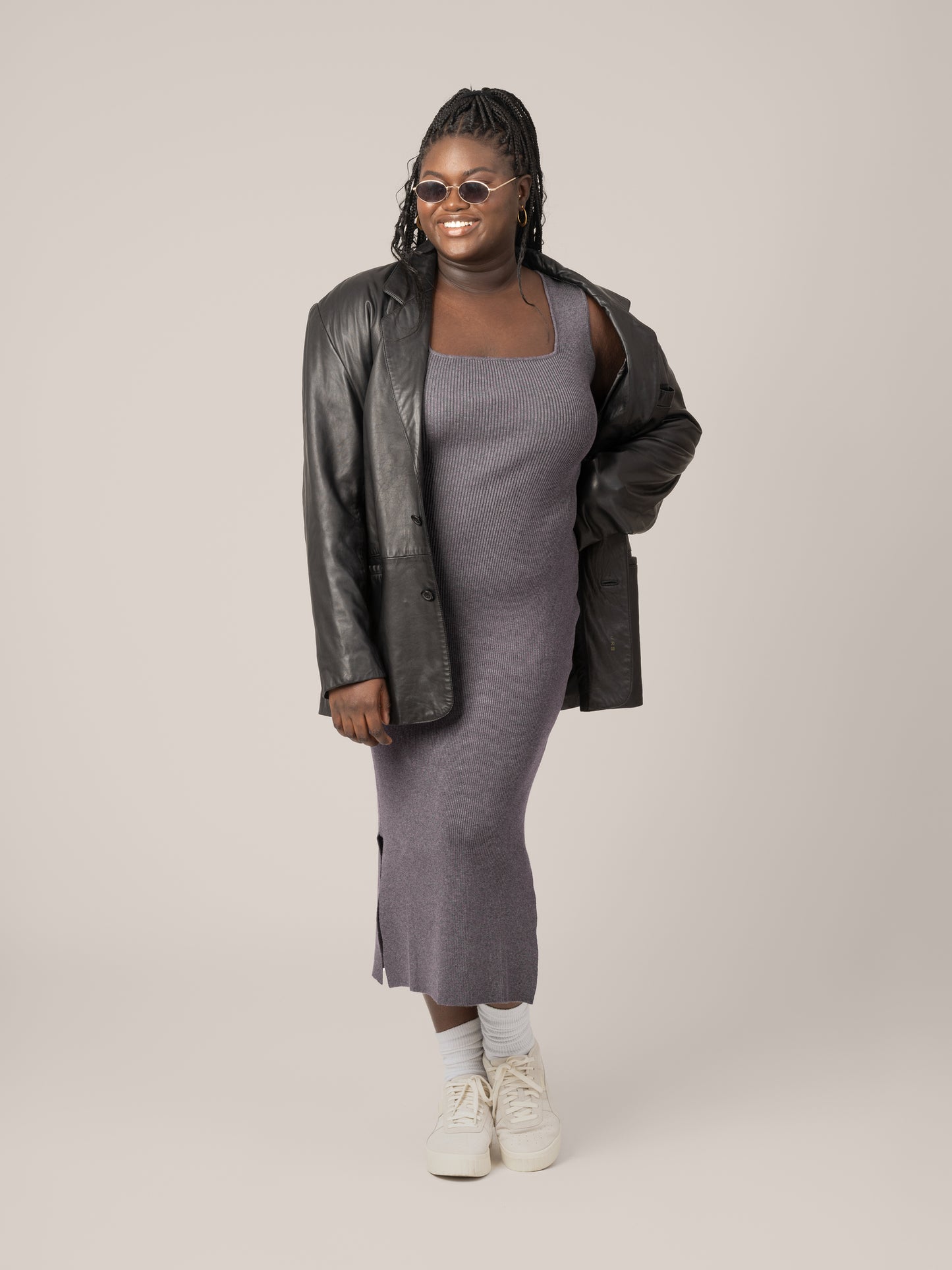 Front view of model wearing the 2-in-1 Maternity & Nursing Midi Dress in Charcoal, with top long-sleeve cropped layer removed and paired with jacked