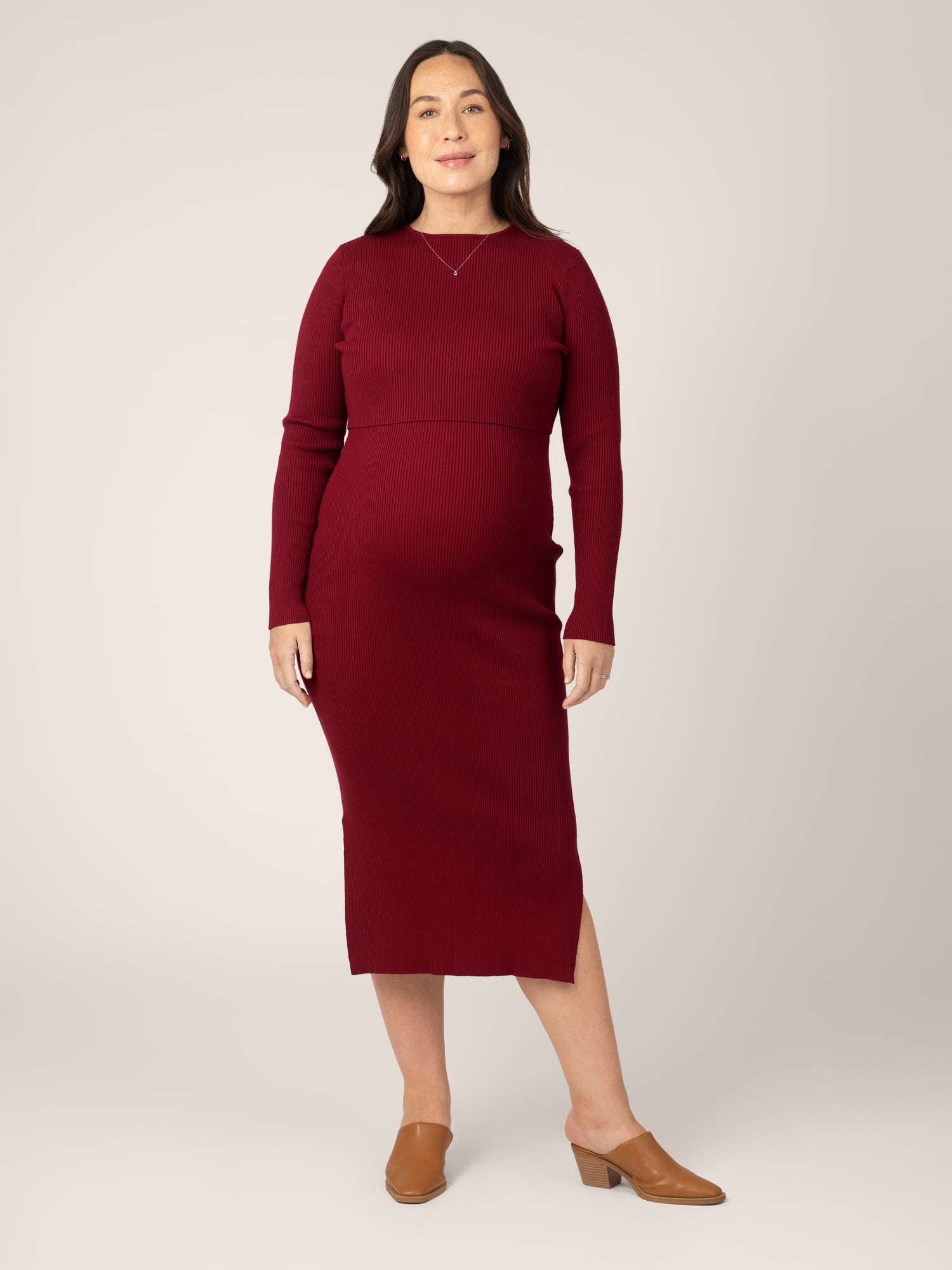 Front view of model wearing the 2-in-1 Maternity & Nursing Midi Dress in Garnet