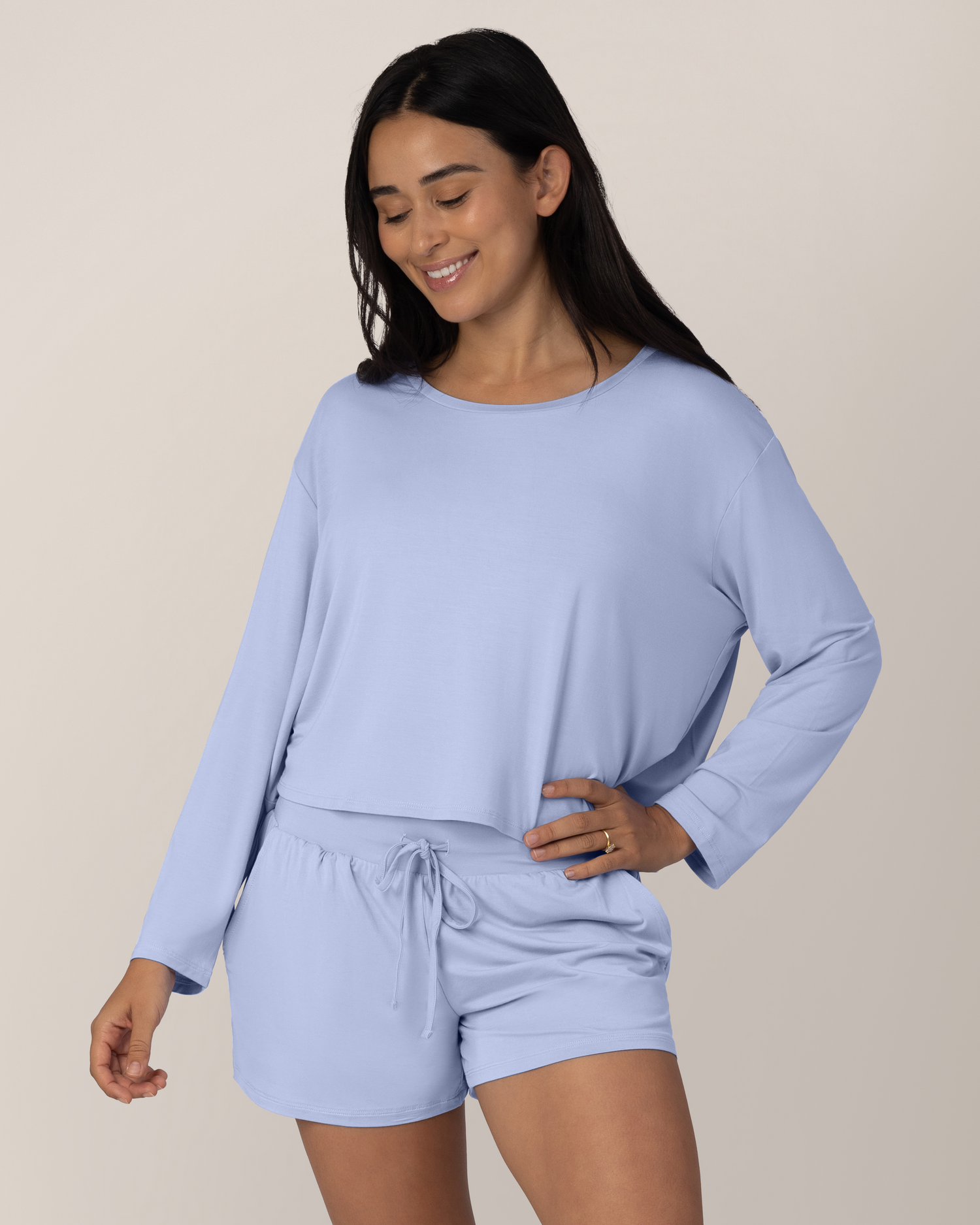 Front view of model wearing the Aria Bamboo Casual Cropped Long Sleeve Top in Periwinkle @model_info:Anamaria is wearing a Medium.