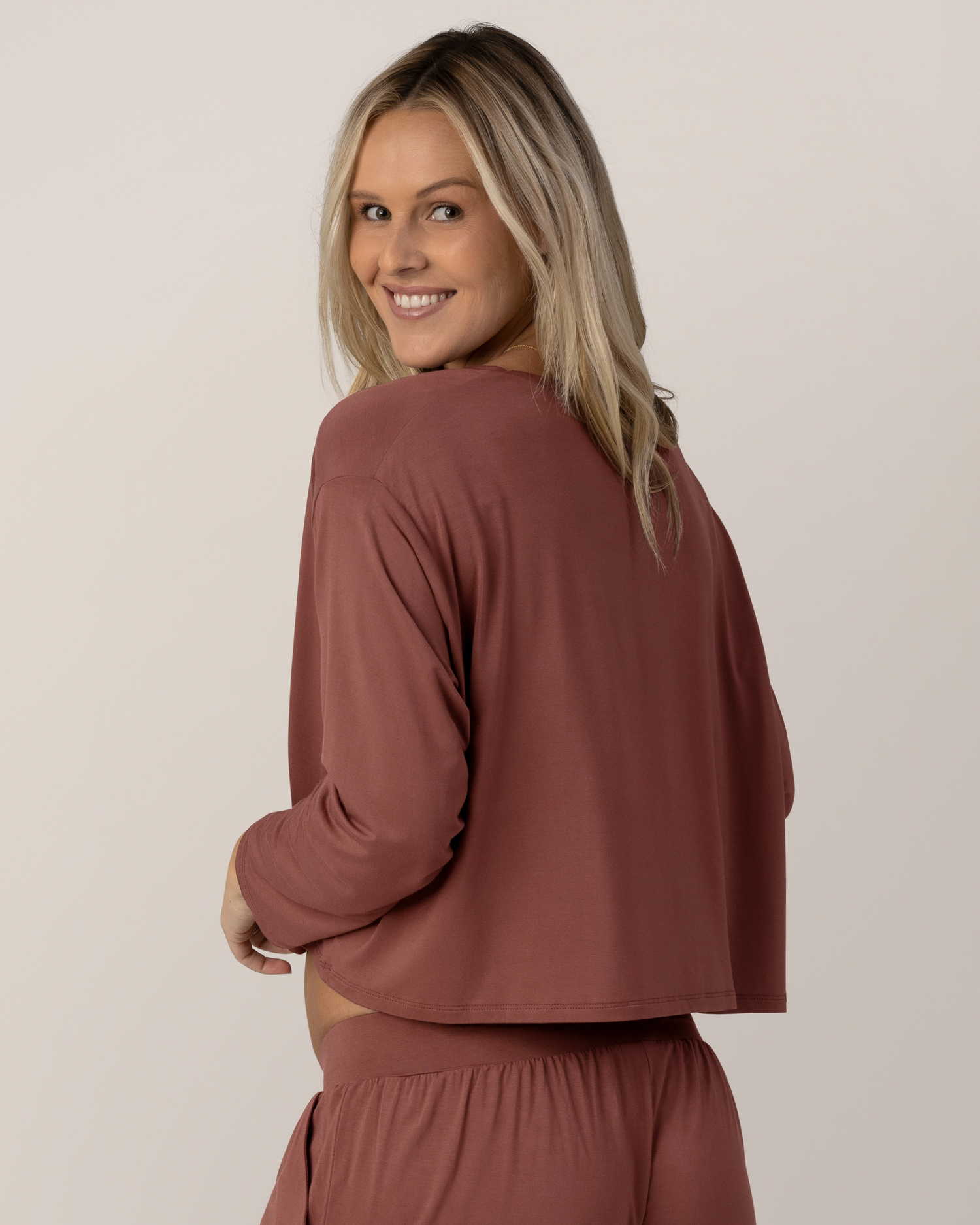 Back view of model wearing the Aria Bamboo Casual Cropped long Sleeve Top in Redwood with the matching Aria Bamboo Casual Lounge Pant