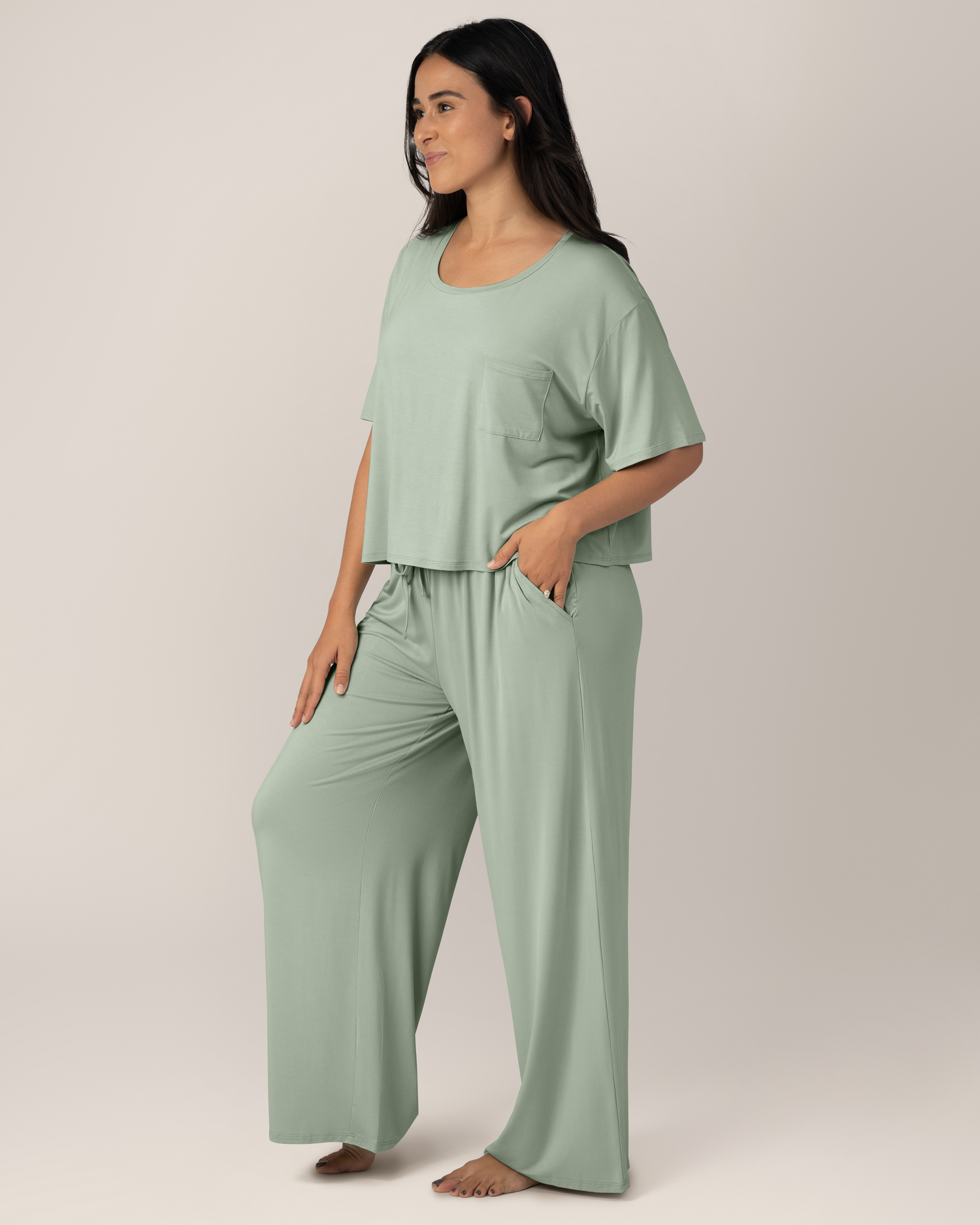 Model standing wearing the Aria Bamboo Casual Cropped Short Sleeve Top in Aqua Mist with the matching Aria Bamboo Casual Lounge Pant