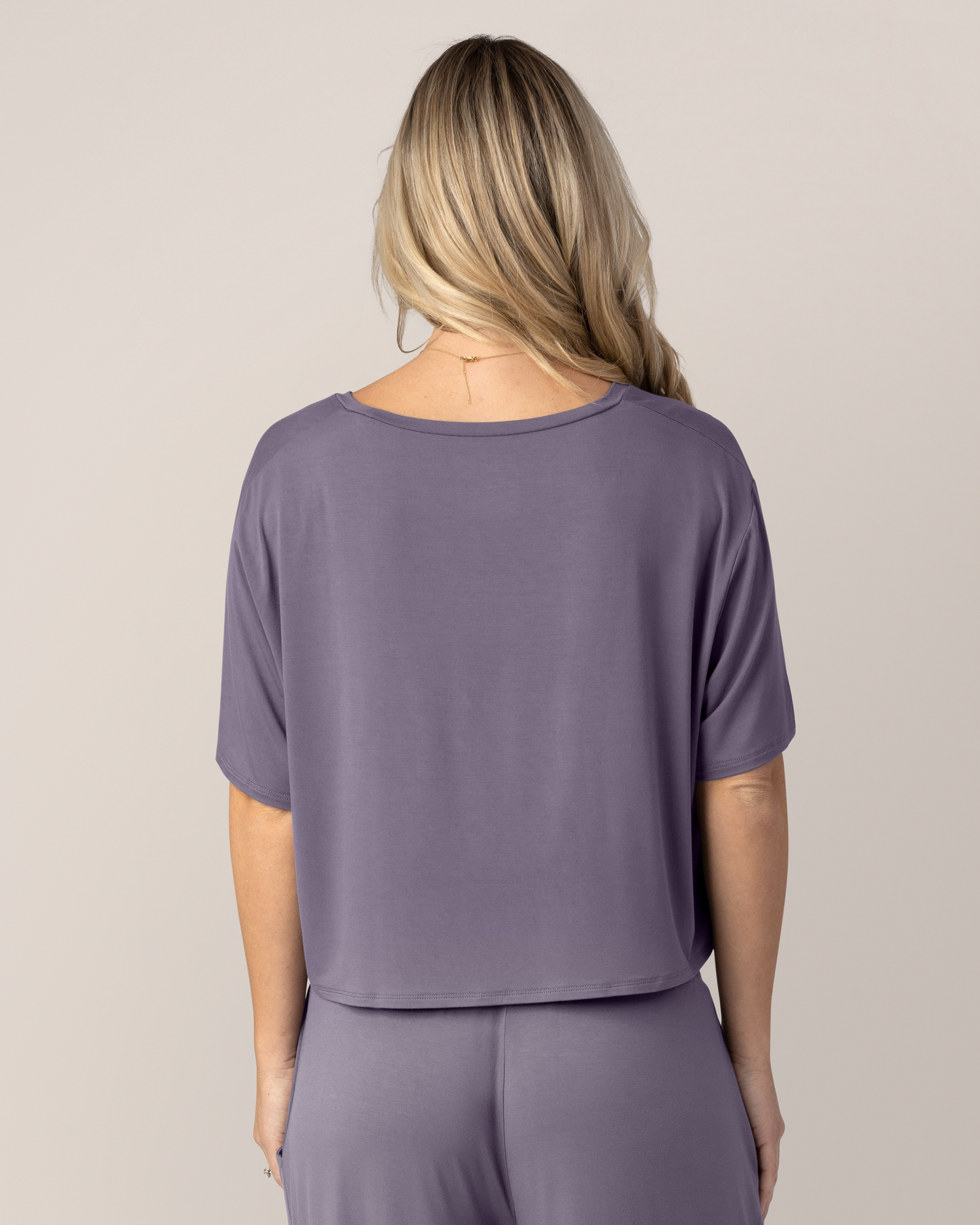 Back view of pregnant model wearing the Aria Bamboo Casual Cropped Short Sleeve Top in Granite