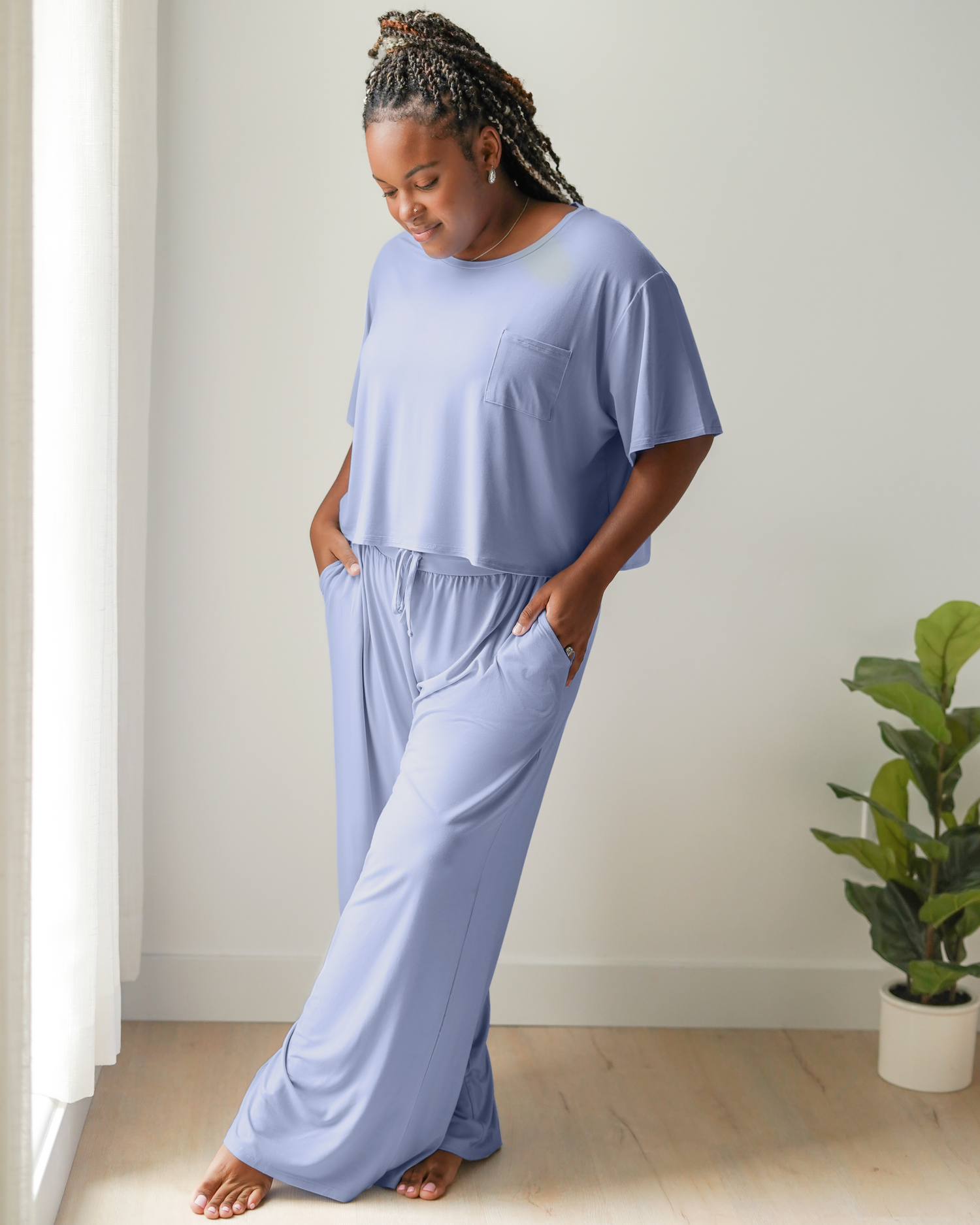 Model standing wearing the Aria Bamboo Casual Cropped Short Sleeve Top in Periwinkle with the matching Aria Bamboo Casual Lounge Pant @model_info:Tonia is wearing a Large.