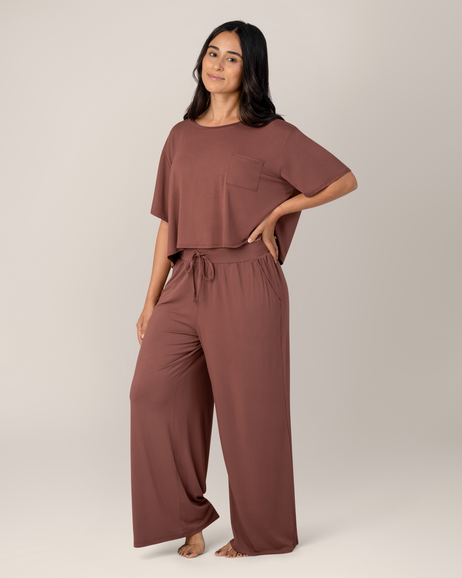 Model standing wearing the Aria Bamboo Casual Cropped Short Sleeve Top in Redwood with the matching Aria Bamboo Casual Lounge Pant