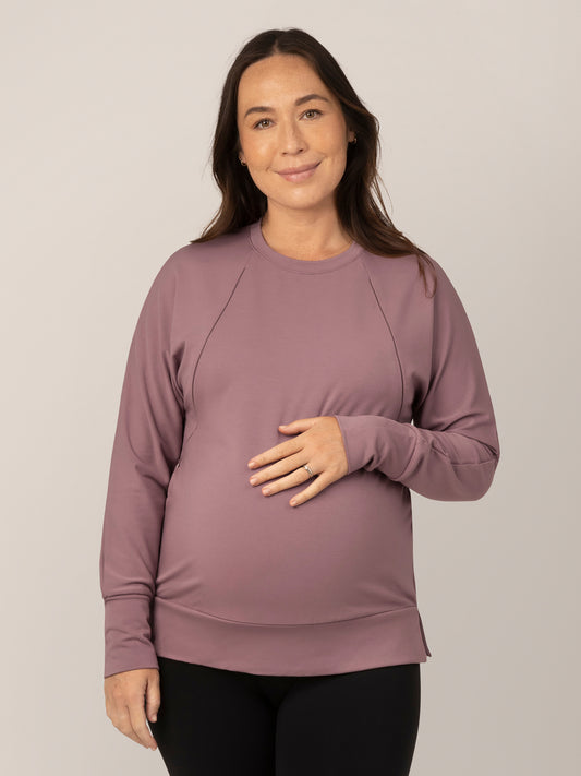 Front view of pregnant model wearing the Bamboo Maternity & Nursing Crew Neck Sweatshirt in Twilight.@model_info:Susanna is wearing a Medium.