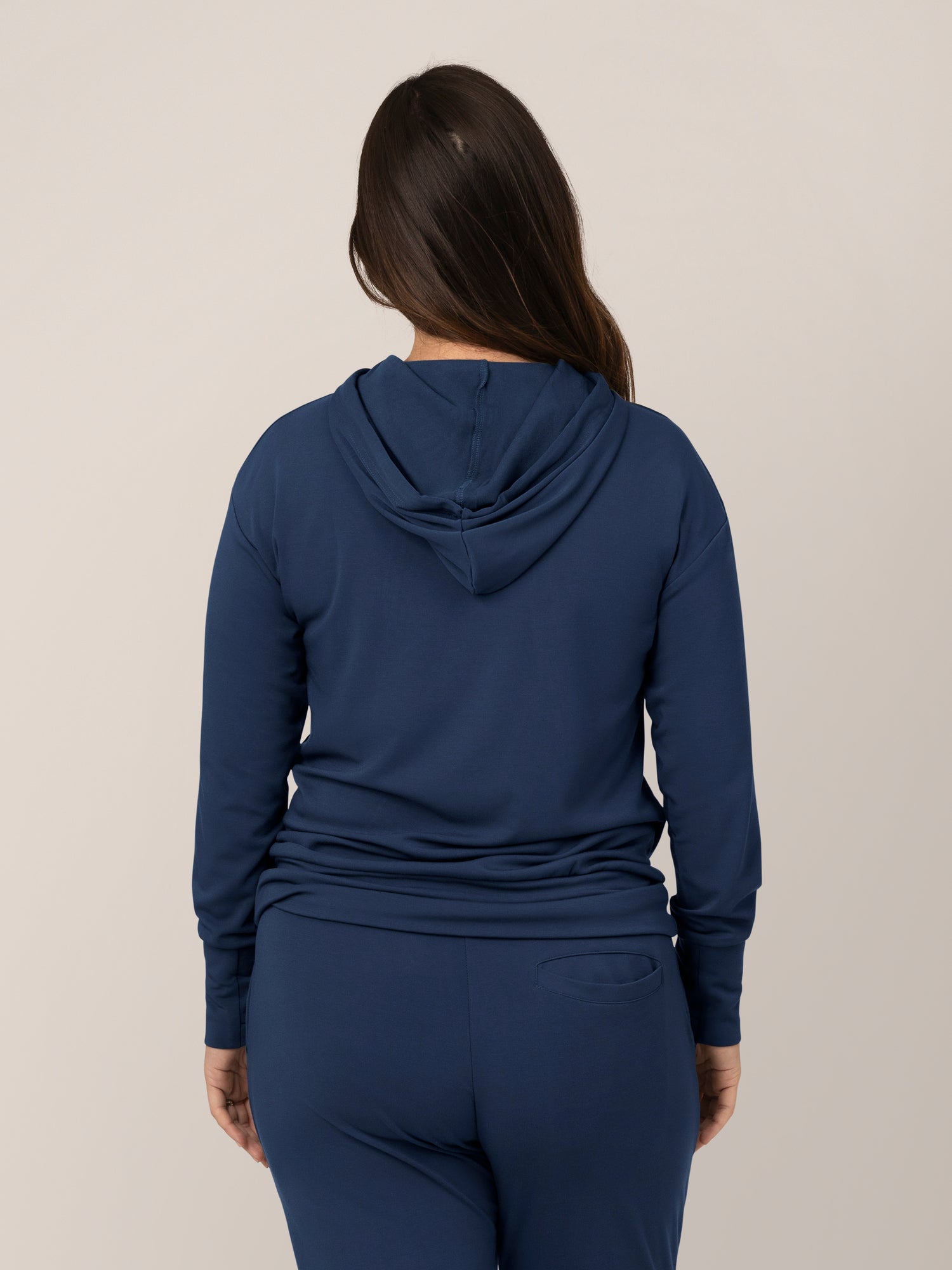 Back view of model wearing the Bamboo Maternity & Nursing Hoodie in Navy