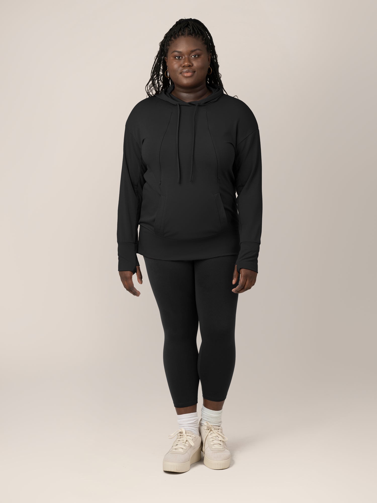 Full body view of model wearing the Bamboo Maternity & Nursing Hoodie in black, paired with Louisa leggings