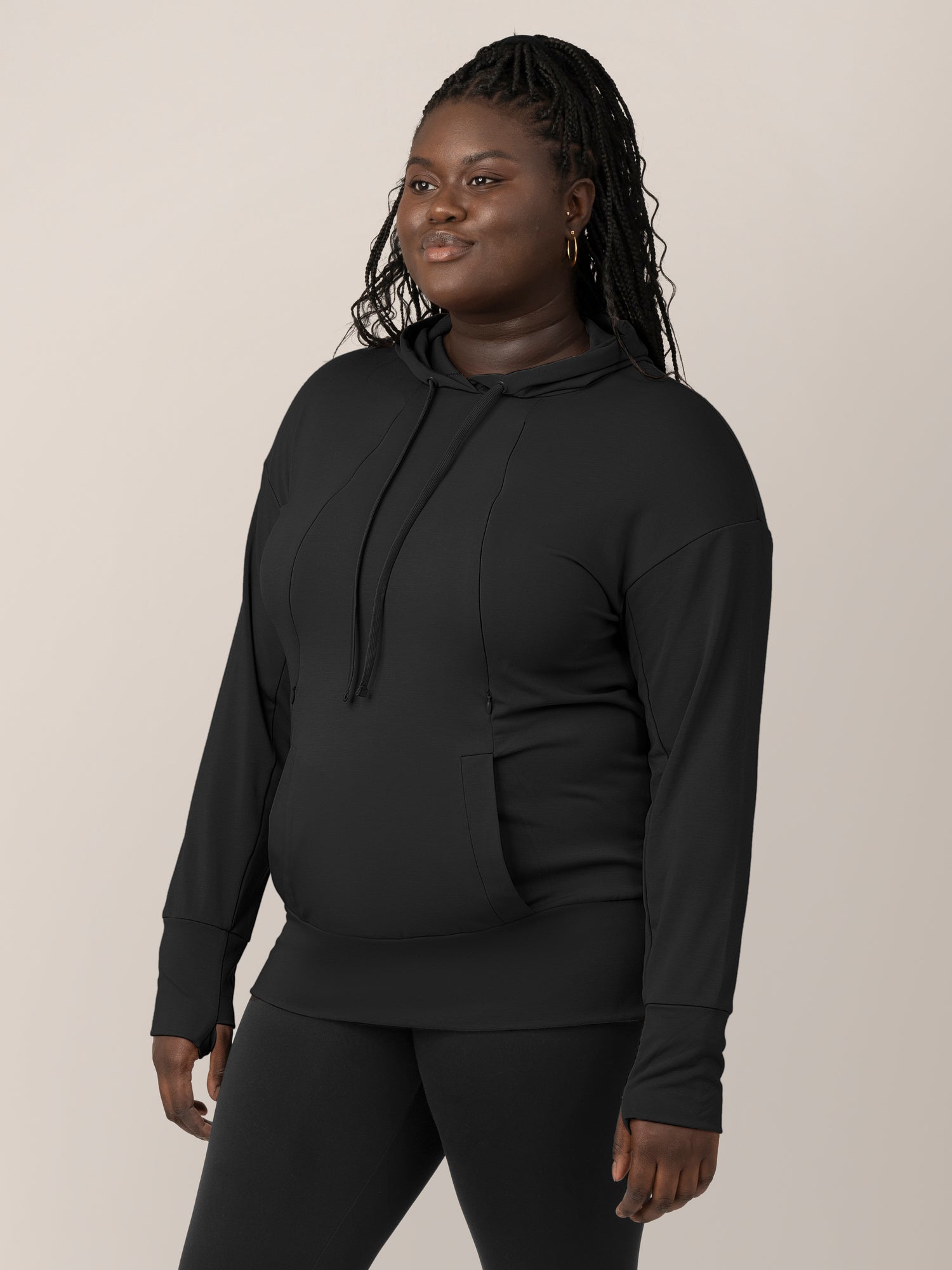 3/4 view of model wearing the Bamboo Maternity & Nursing Hoodie in black,