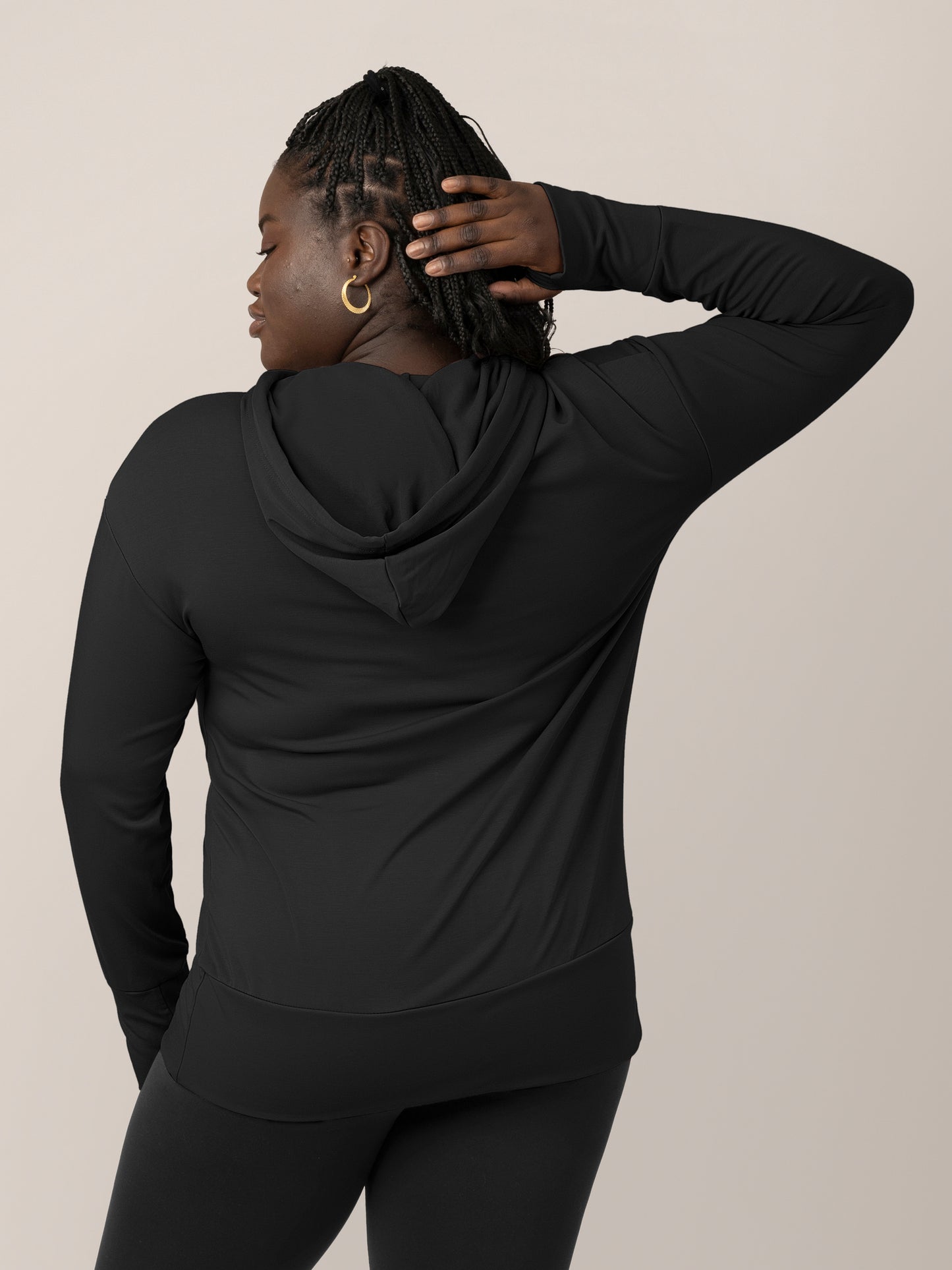 Back view of model wearing the Bamboo Maternity & Nursing Hoodie in black,