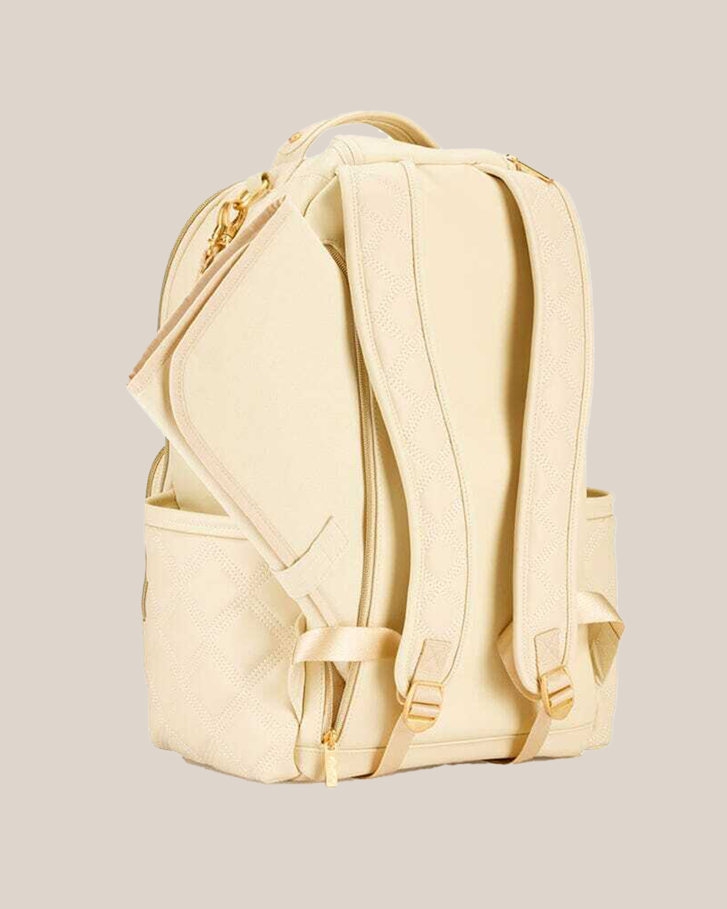 Back view of the Itzy Ritzy - Boss Plus™ Diaper Bag Backpack in Milk & Honey, showing changing pad pocket