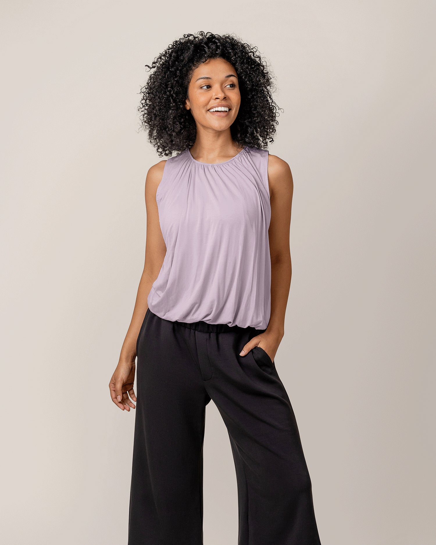 Model wearing the Piper Bubble Hem Nursing Tank in Lavender Mist @model_info:Marisa is wearing a Small.