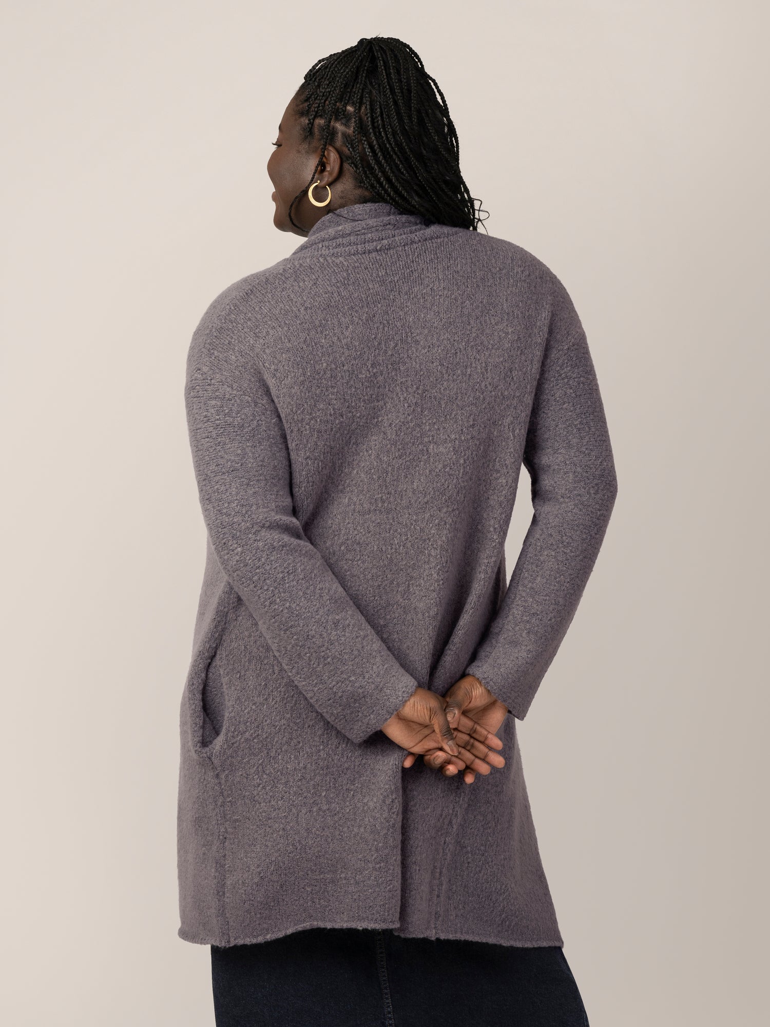 Back view of model wearing the Chloe Cardigan Sweater in Charcoal