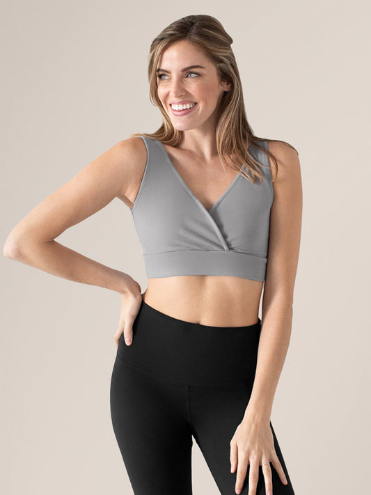 Model wearing the Organic Cotton Sleep & Nursing Bra in Grey @model_info:Mia is wearing a Small.