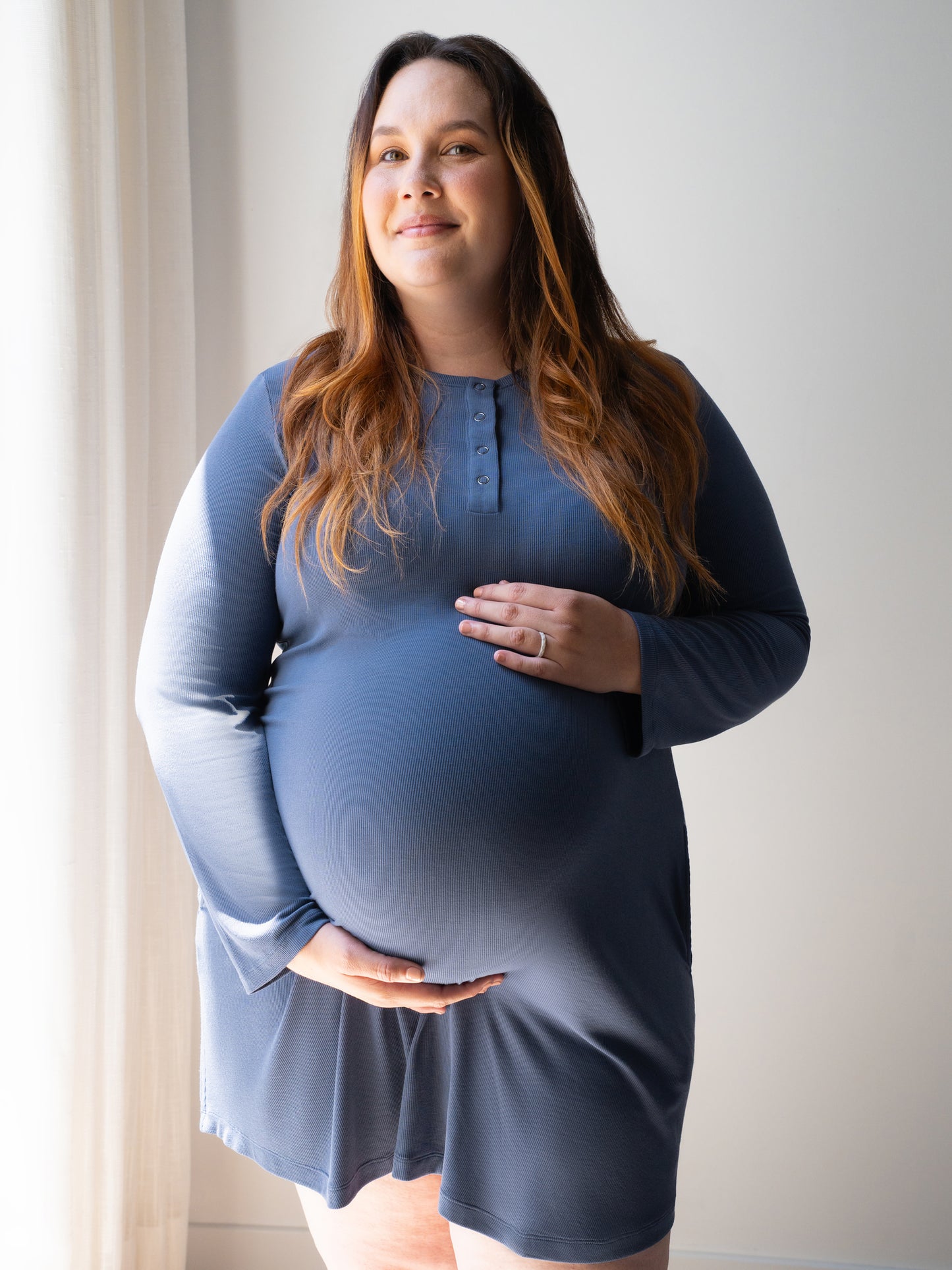 Front view of pregnant model wearing the Riley Ribbed Bamboo Maternity & Nursing Nightgown in Slate Blue. @model_info:Jessica is 5'5" and wearing a 1X.