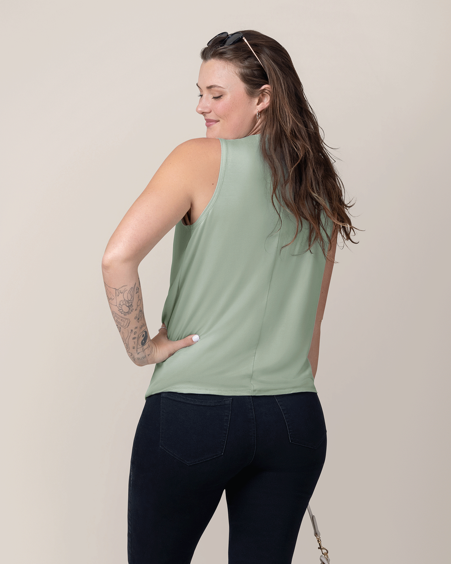 Back view of model wearing the Bamboo Draped Nursing Tank in Aqua Mist 