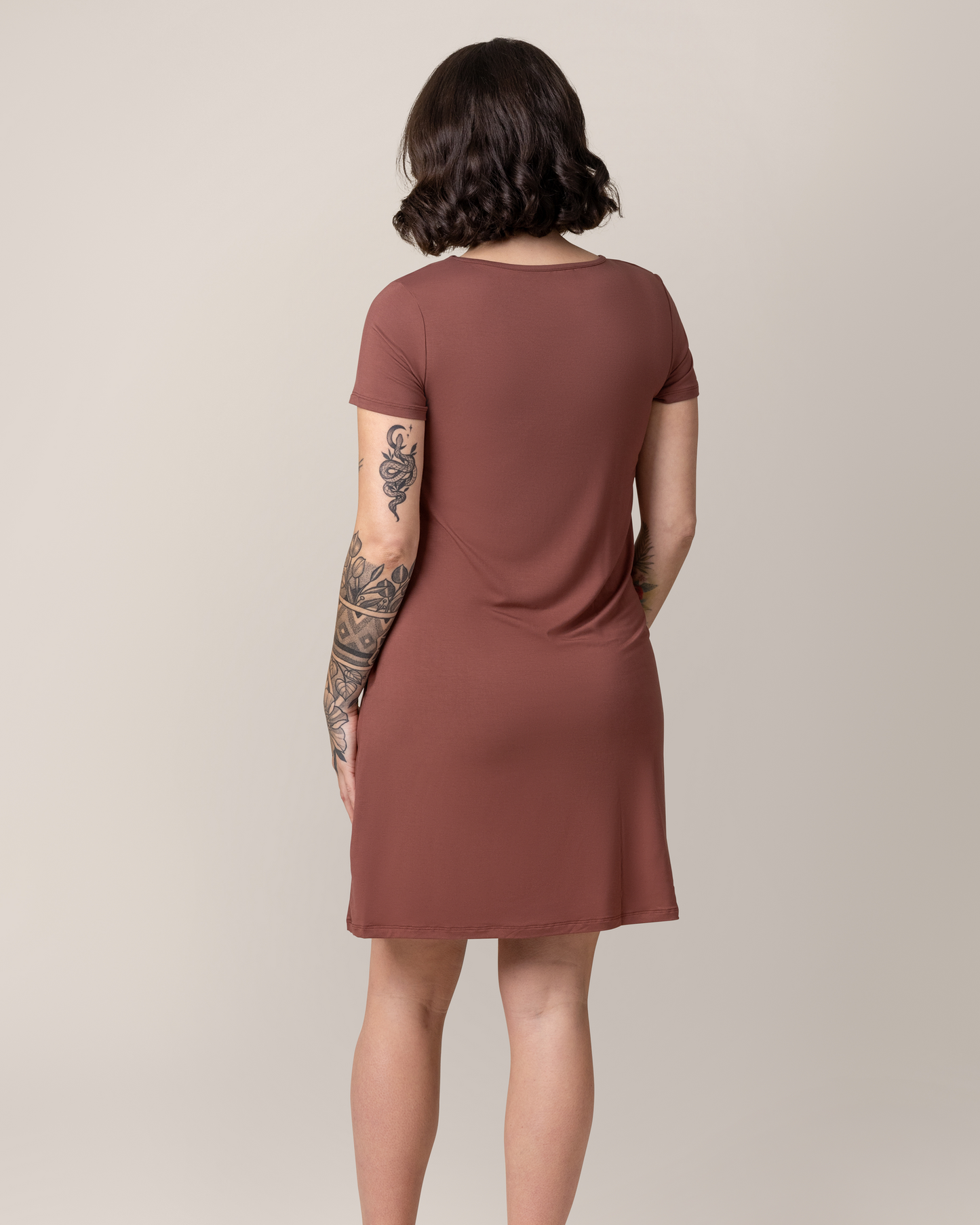 Back view of model wearing the Eleanora Bamboo Maternity & Nursing Dress in Redwood