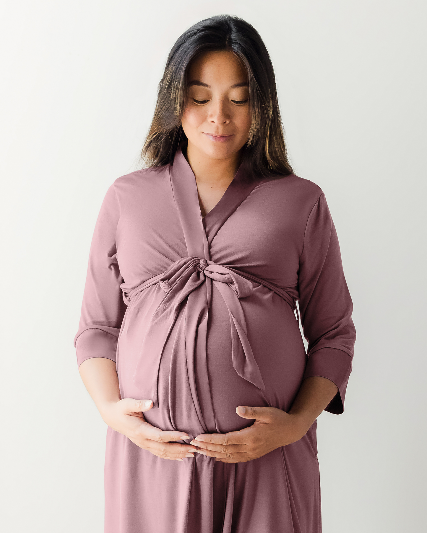 Pregnant model wearing the Emmaline Robe in Twilight