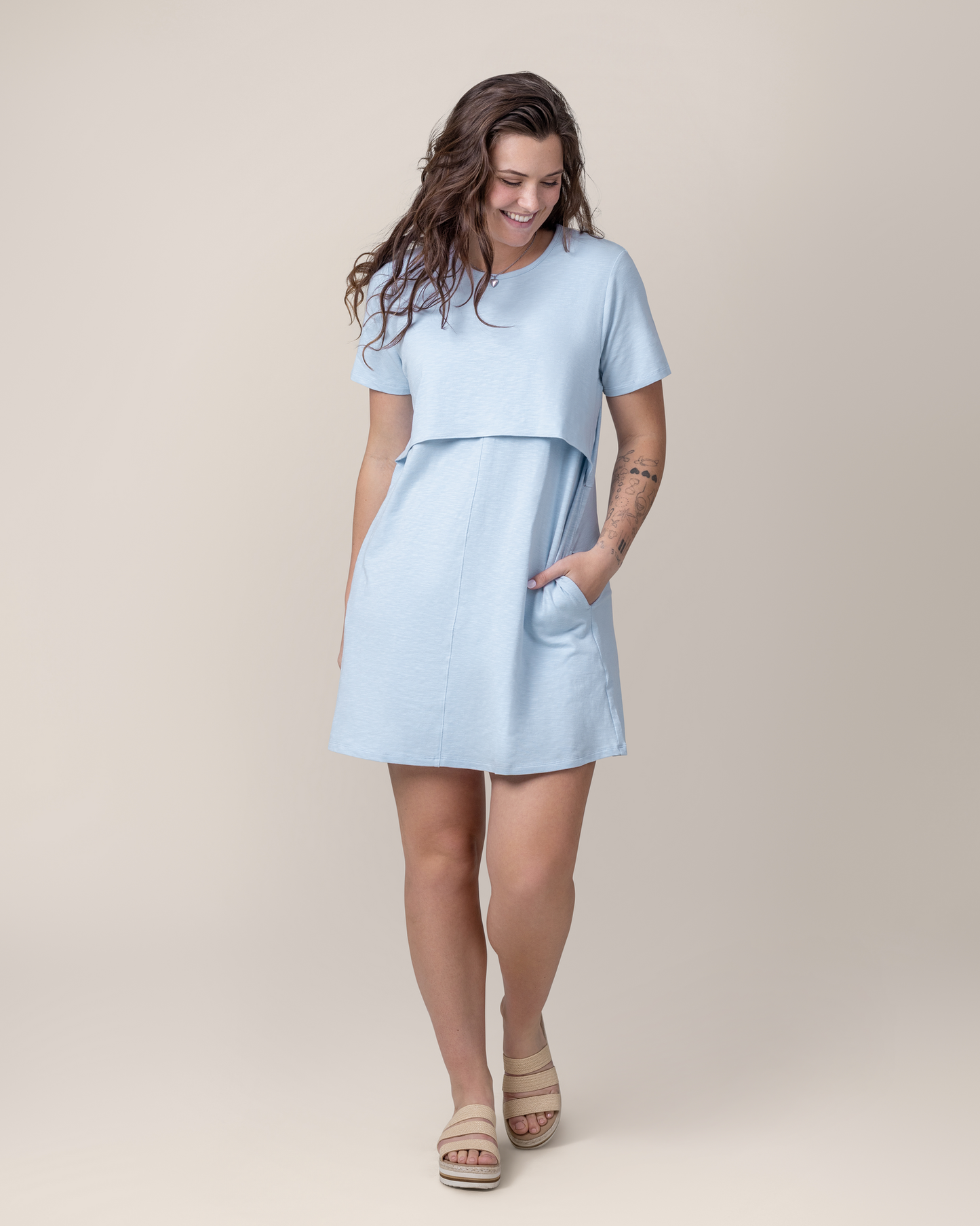 Front view of model wearing the Emmie Nursing T-shirt Dress in French Blue @model_info:Gibson is 5'9" and wearing a Medium.