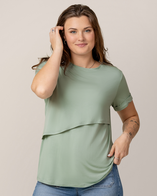 Front view of model wearing the Everyday Asymmetrical Nursing T-shirt in Aqua Mist @model_info:Gibson is wearing a Medium.