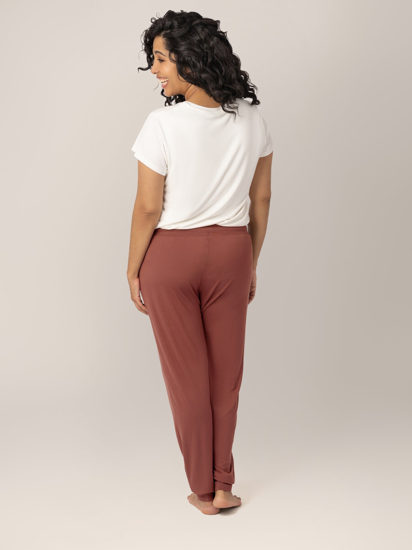 Back view of model wearing the Everyday Lounger Jogger in Redwood.