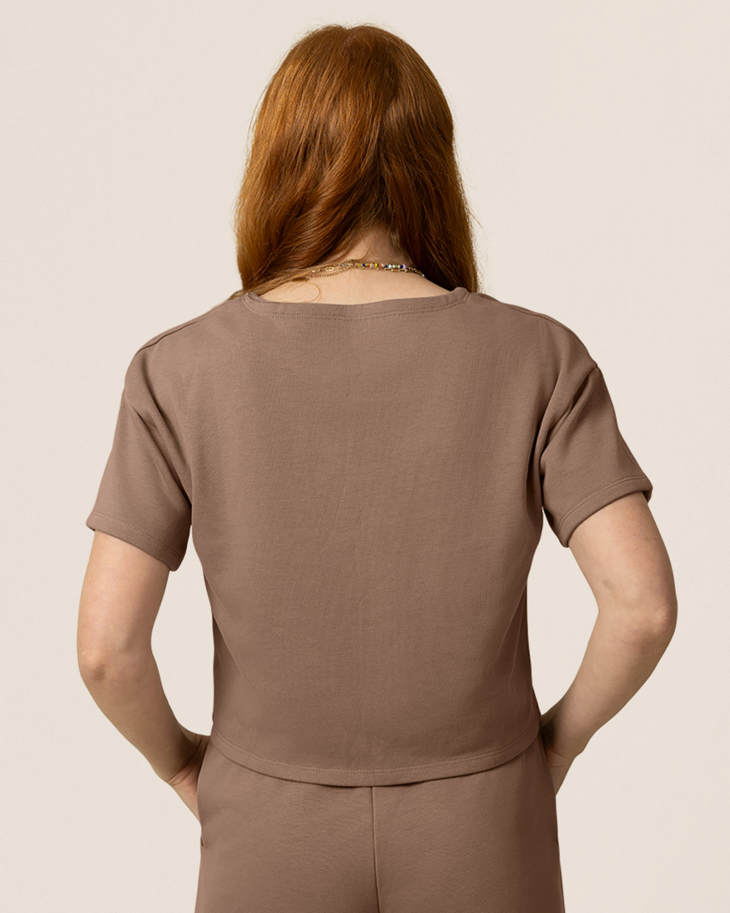 Back view of model wearing French Terry Nursing T-shirt in Taupe