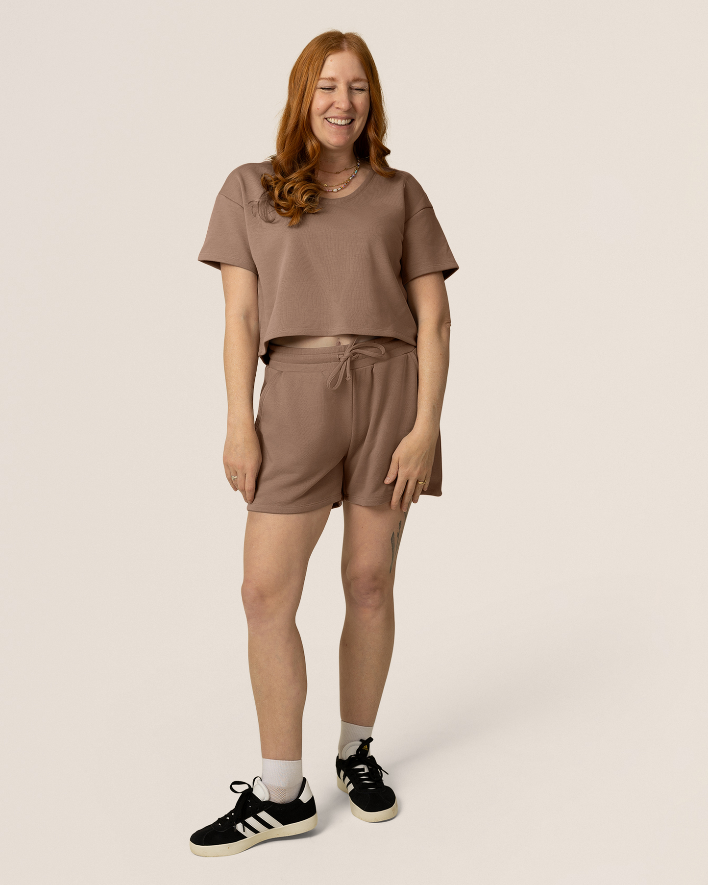 Front view of model wearing French Terry Nursing T-shirt in Taupe with matching French Terry On the Go Short 