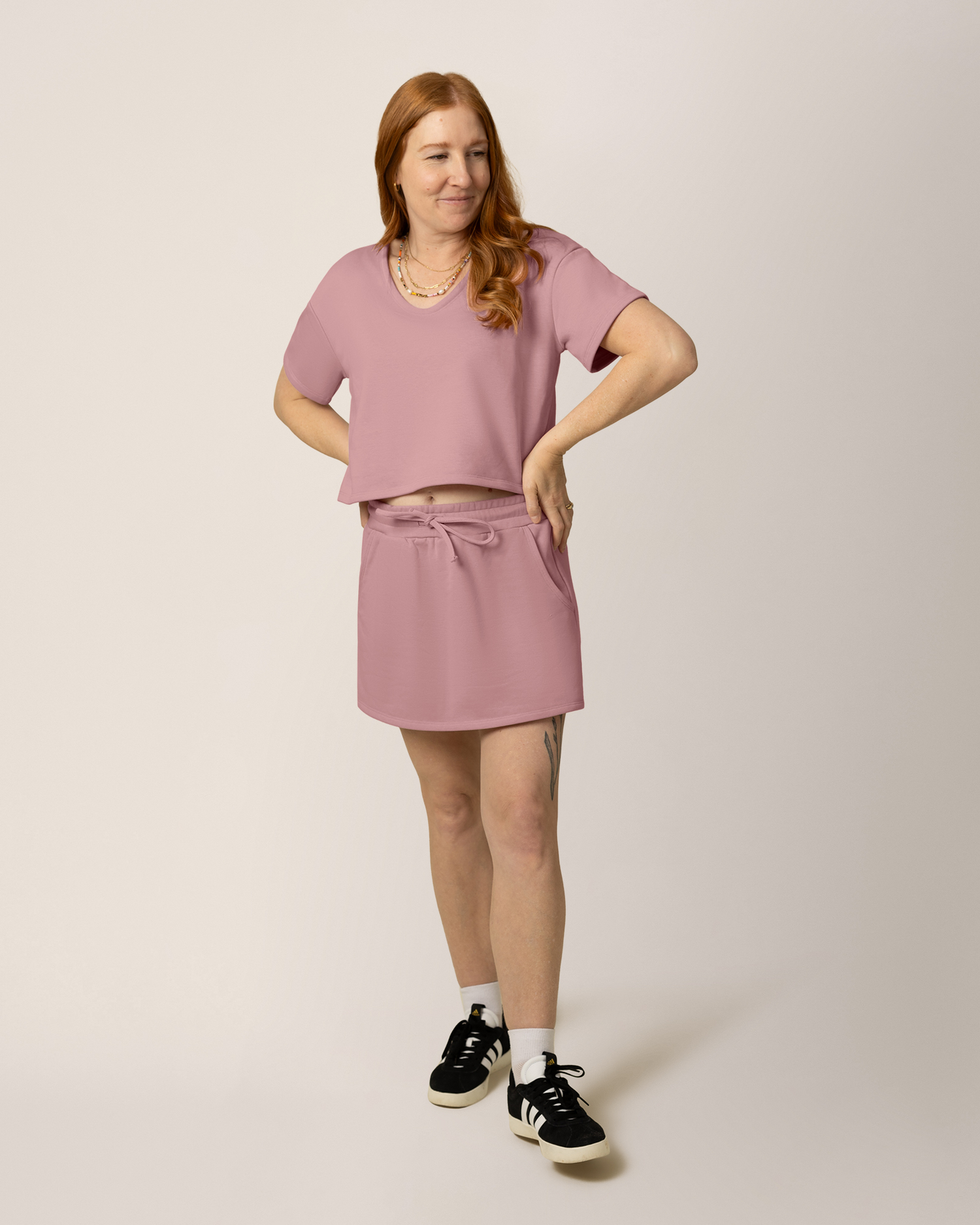 Front view of model wearing French Terry Nursing T-shirt in Light Mauve with matching French Terry On the Go Skort 