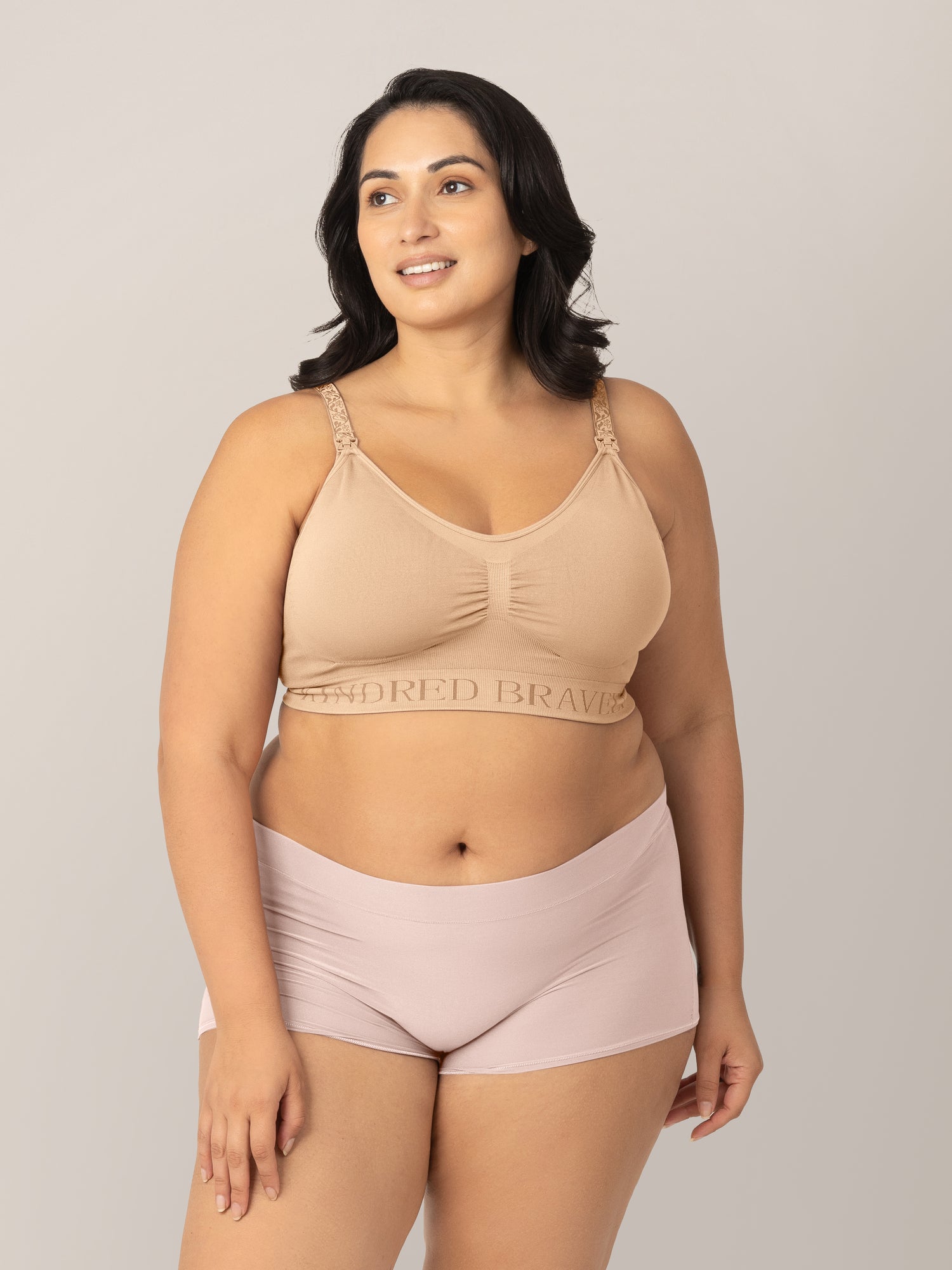 Model wearing the Sublime Nursing Bra styled with the Grow with Me Soft Pink Boyshort Underwear.  @model_info: Connie is wearing an X-Large.