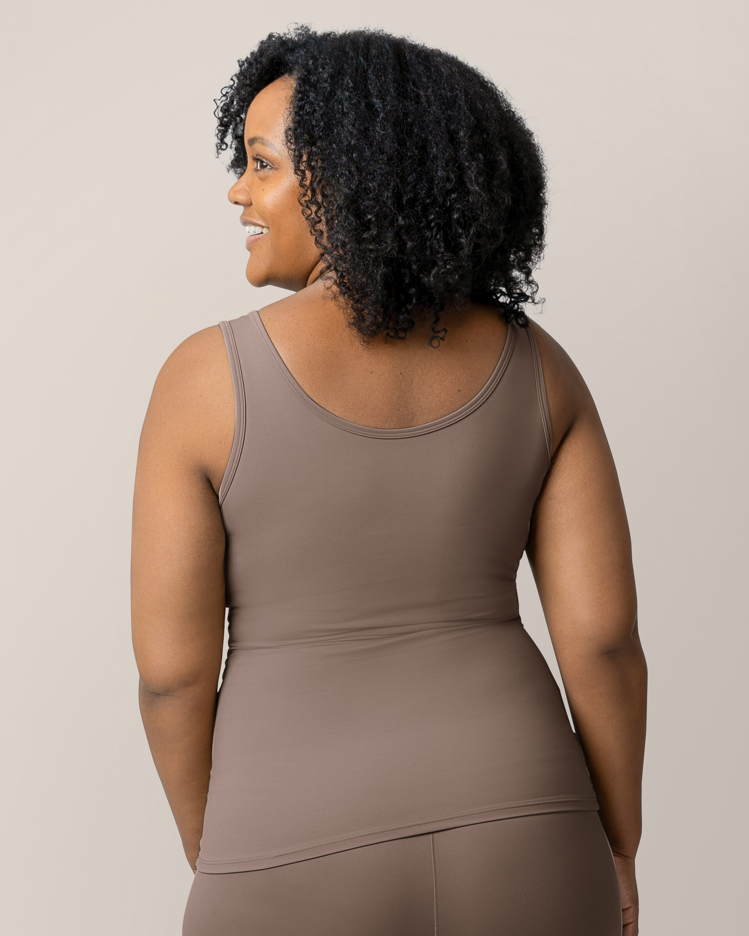 Back view of model wearing the Grow with Me™ Maternity & Nursing Tank in Taupe