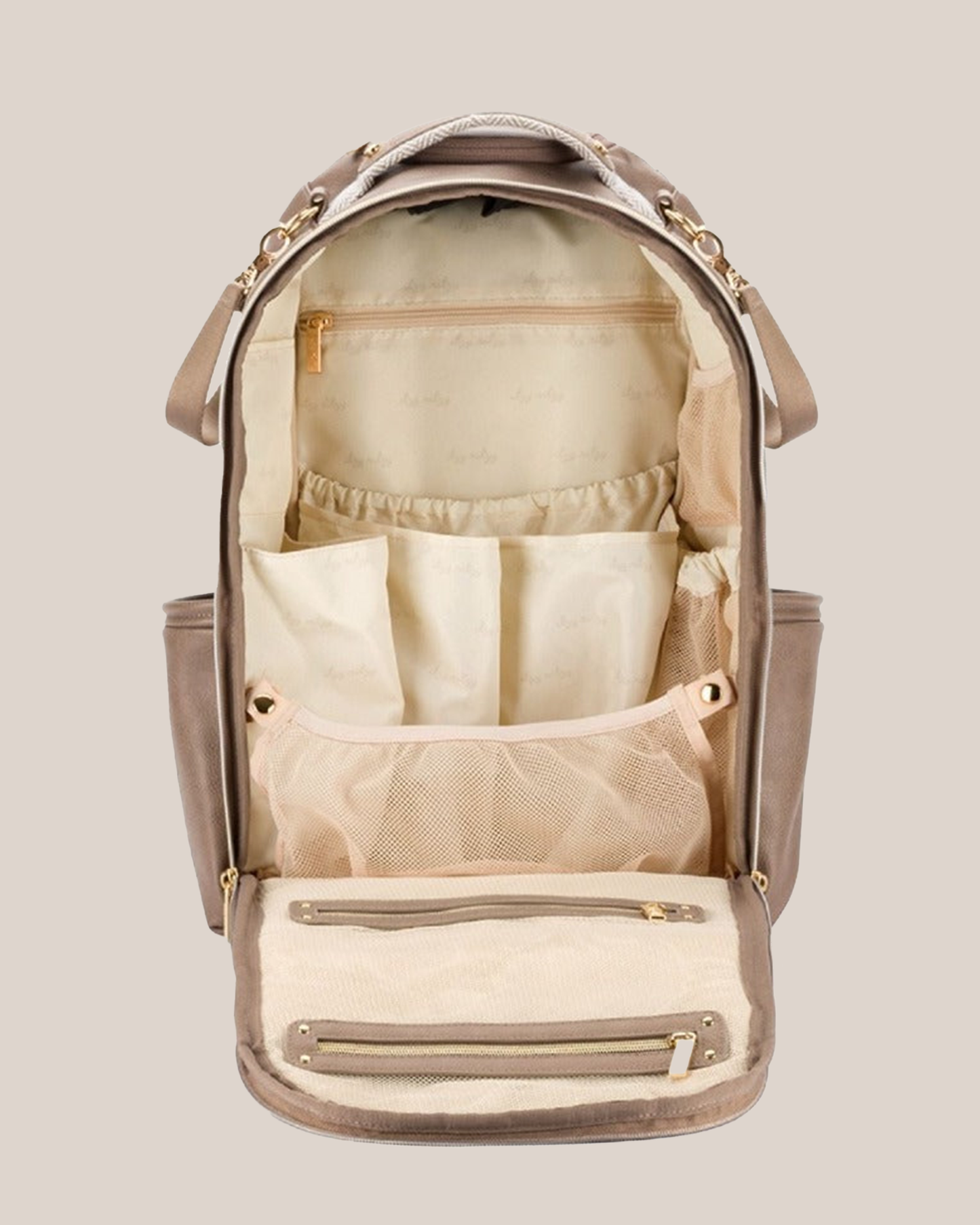 Front open view of the Itzy Ritzy - Boss Plus™ Diaper Bag Backpack in Vanilla Latte