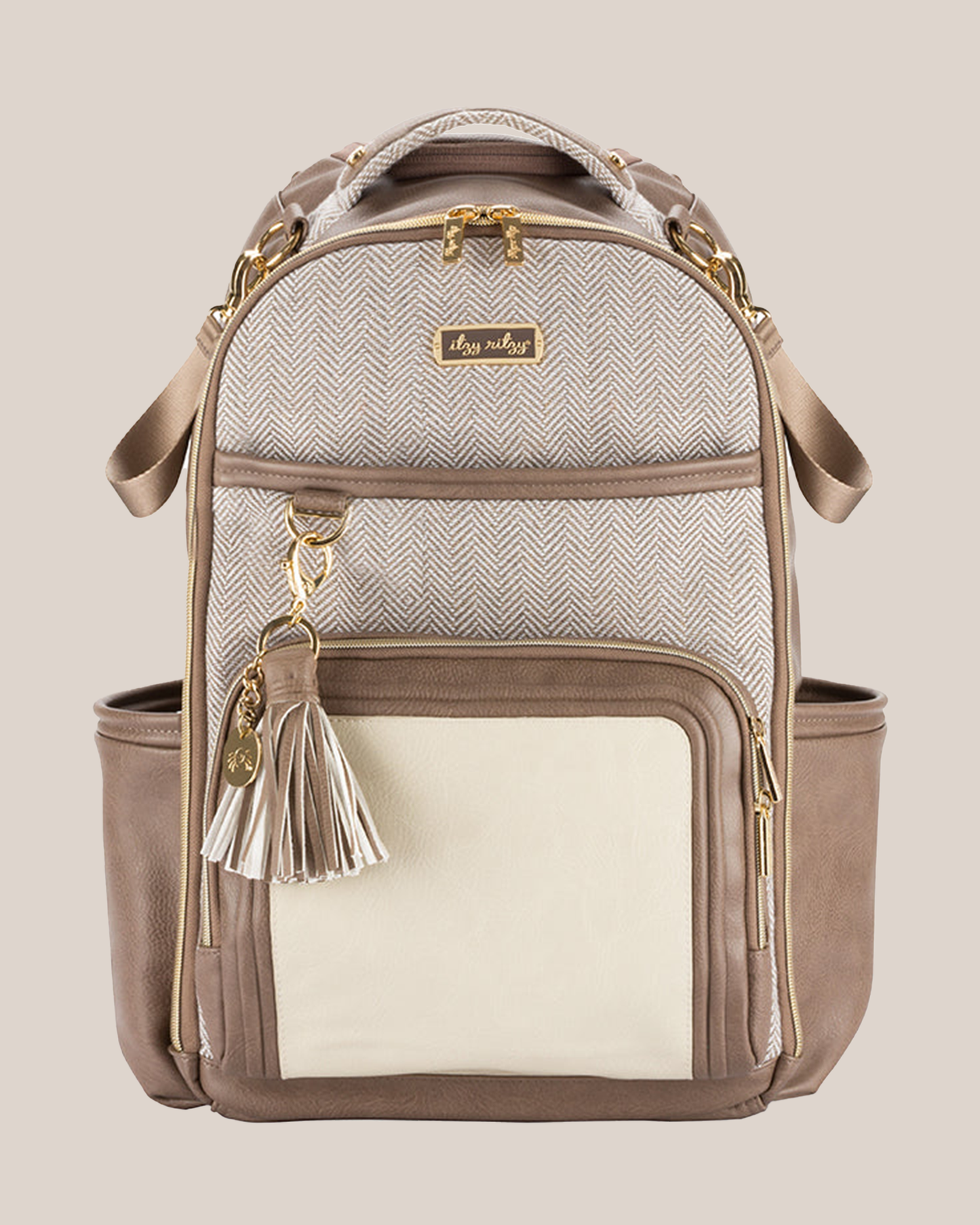 Front view of the Itzy Ritzy - Boss Plus™ Diaper Bag Backpack in Vanilla Latte