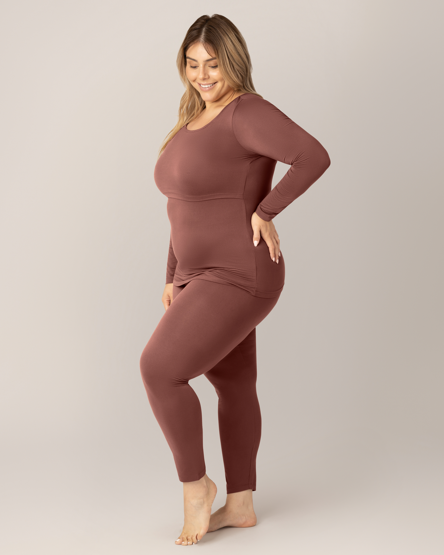 Side view of model wearing the Jane Nursing Pajama Set in Redwood.