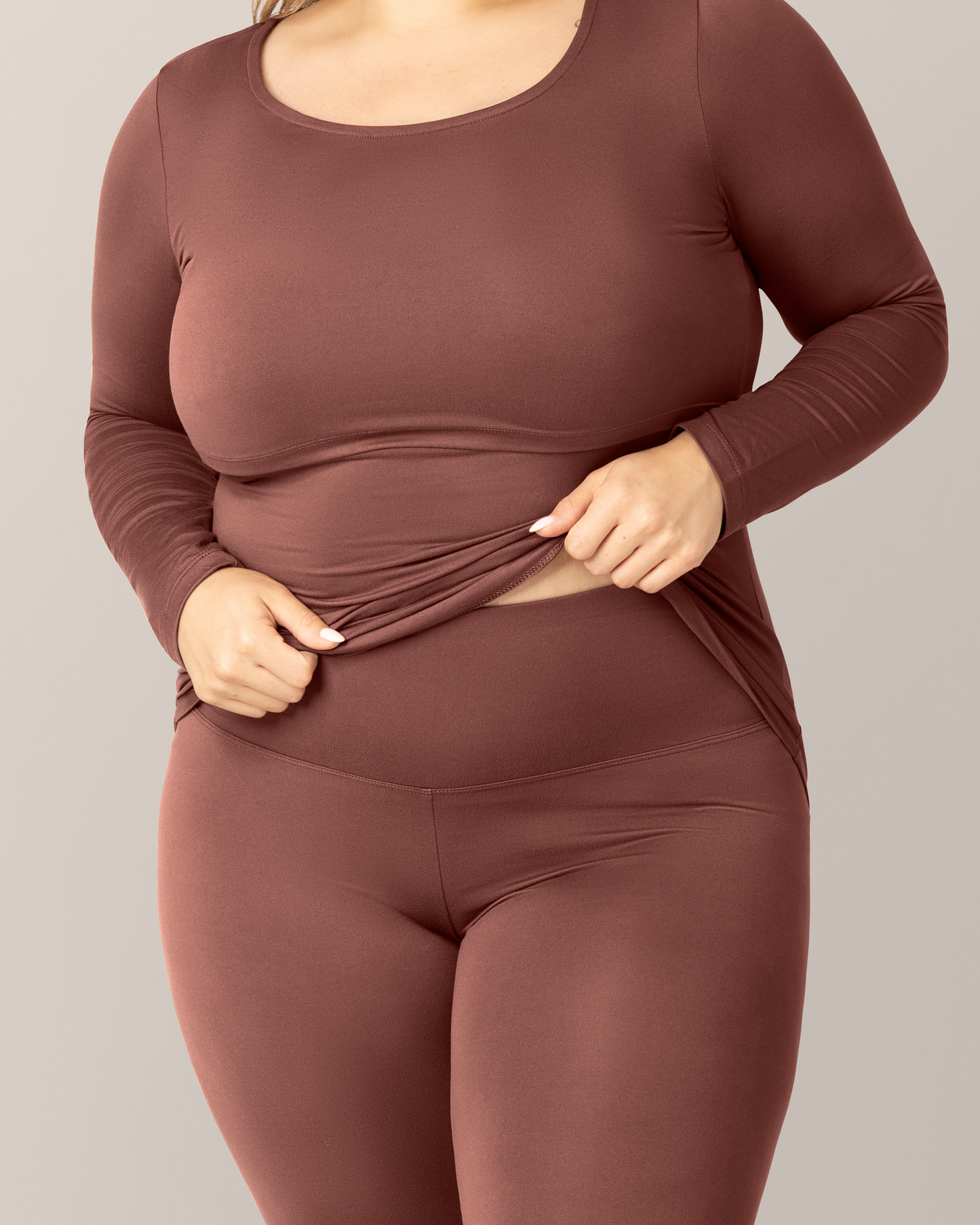 Close up of model wearing the Jane Nursing Pajama Set in Redwood, showing waistband on bottoms.