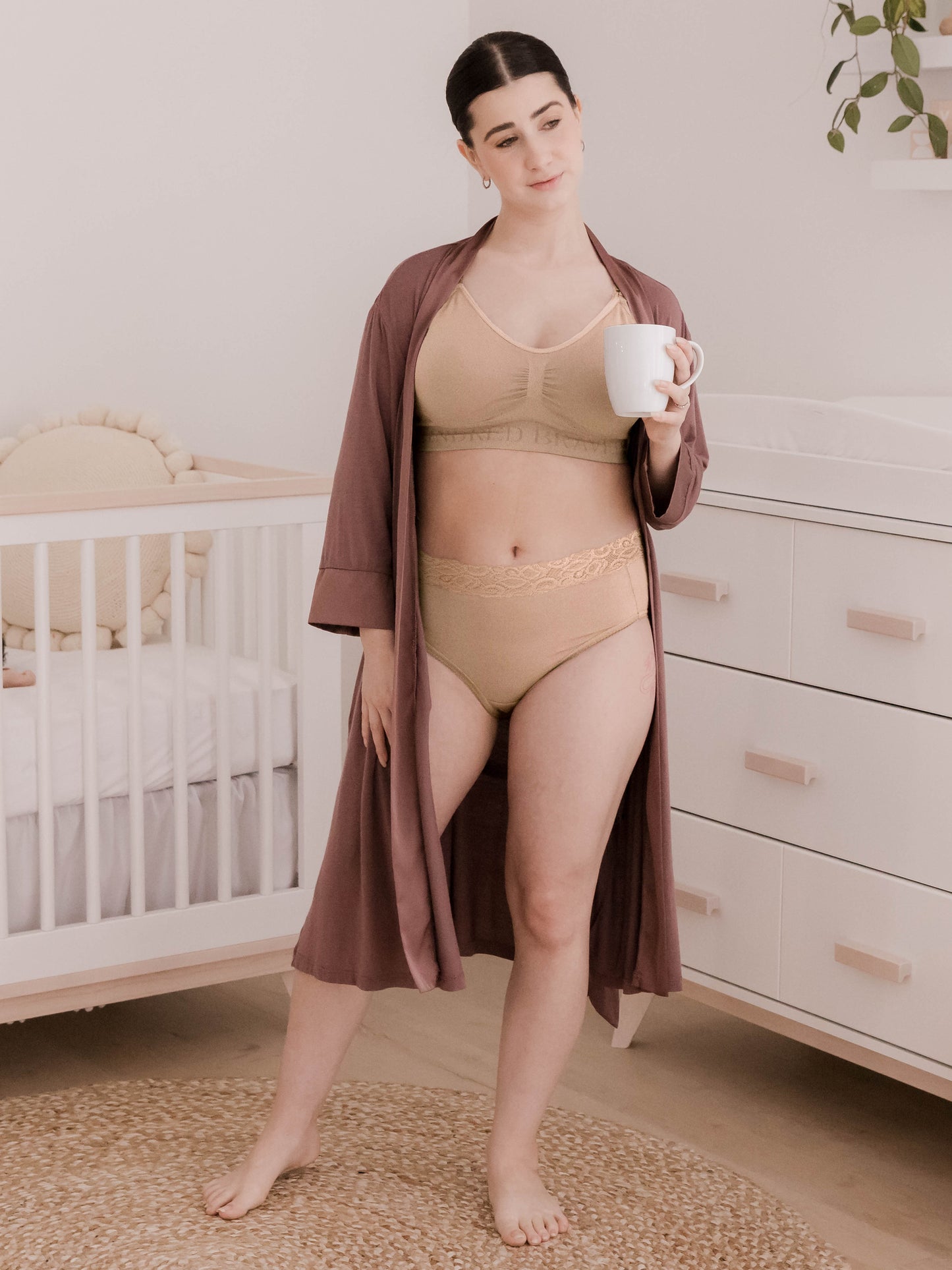 Model wearing the Highwaisted Postpartum Underwear and the Nursing Bra in Beige with the Emmaline Robe. 