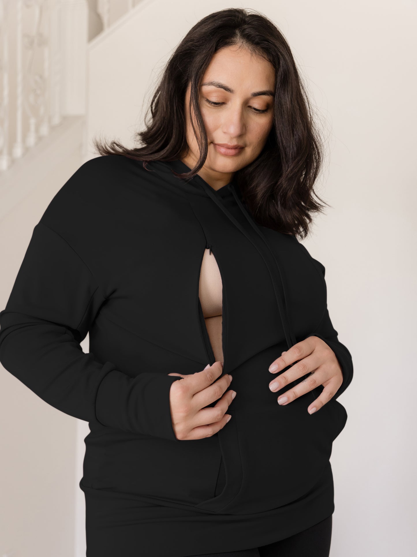 Model showing nursing access on the Bamboo Maternity & Nursing Hoodie in Black