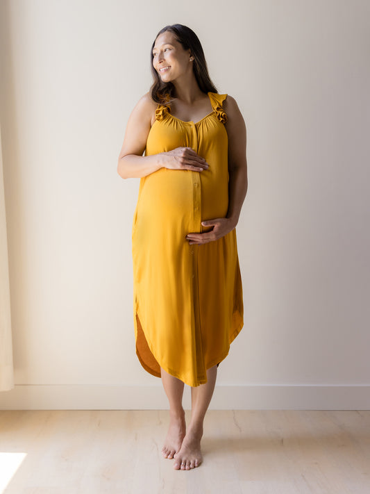 Front view of model wearing the Ruffle Strap Labor & Delivery Gown in Honey. @model_info:Joy is 5'7" and wearing a M/L.