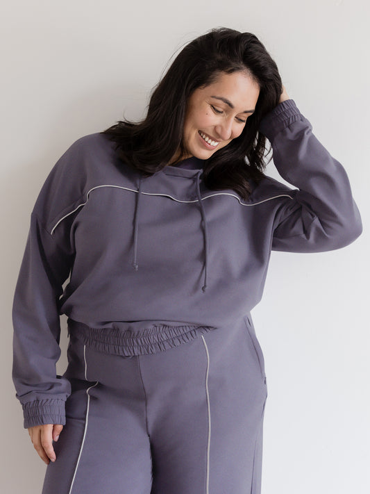 Front view of model wearing the Mila Cropped Nursing Hoodie in Granite @model_info:Connie is wearing a Large.