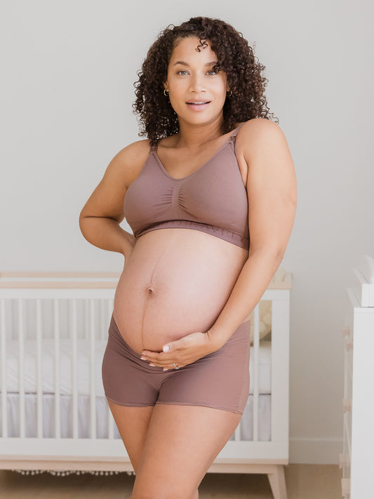 Pregnant model wearing the Twilight Grow with Me™ Maternity & Postpartum Boyshort in Twilight @model_info:Alysha is wearing a Large.