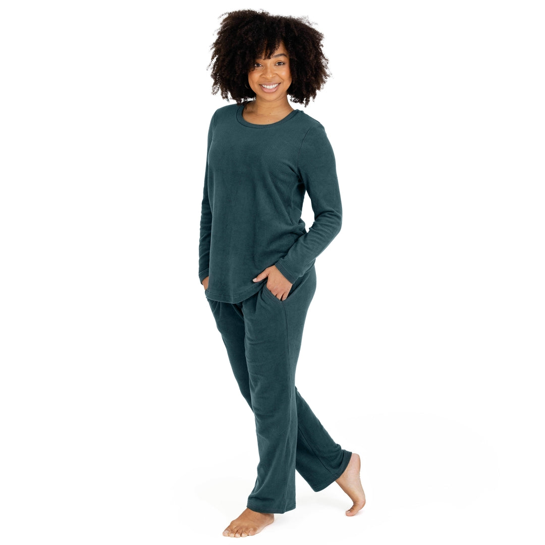 Model wearing the Fleece Nursing & Maternity Pajama Set in Evergreen with her hand in her pocket.