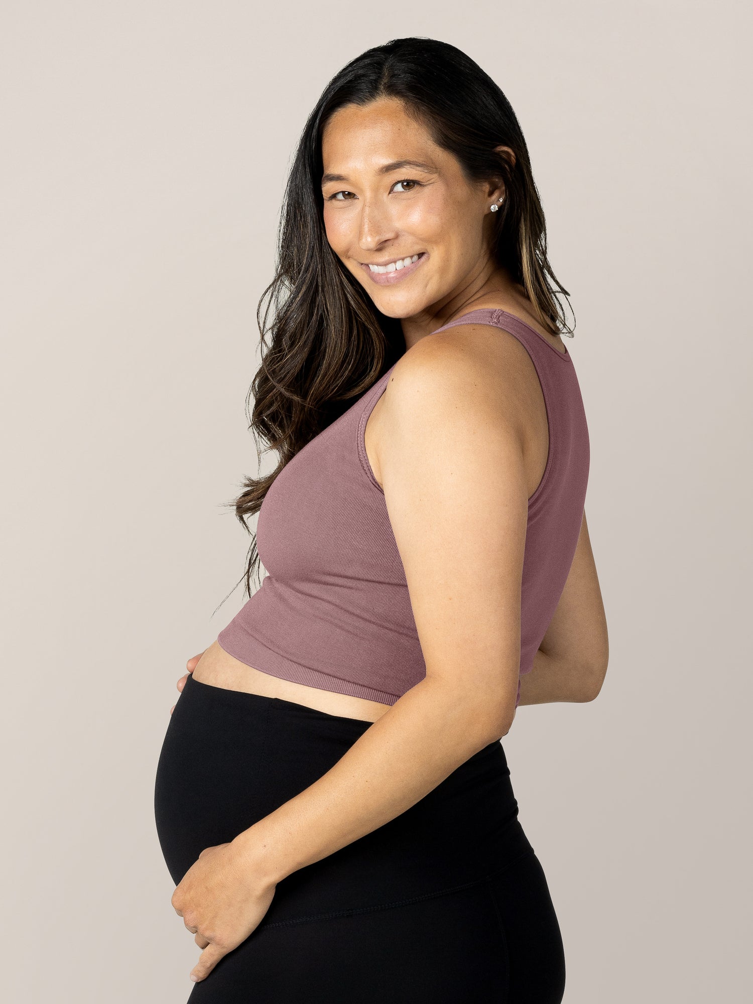 Side view of pregnant model wearing the Sublime® Bamboo Maternity & Nursing Longline Bra in Twilight.