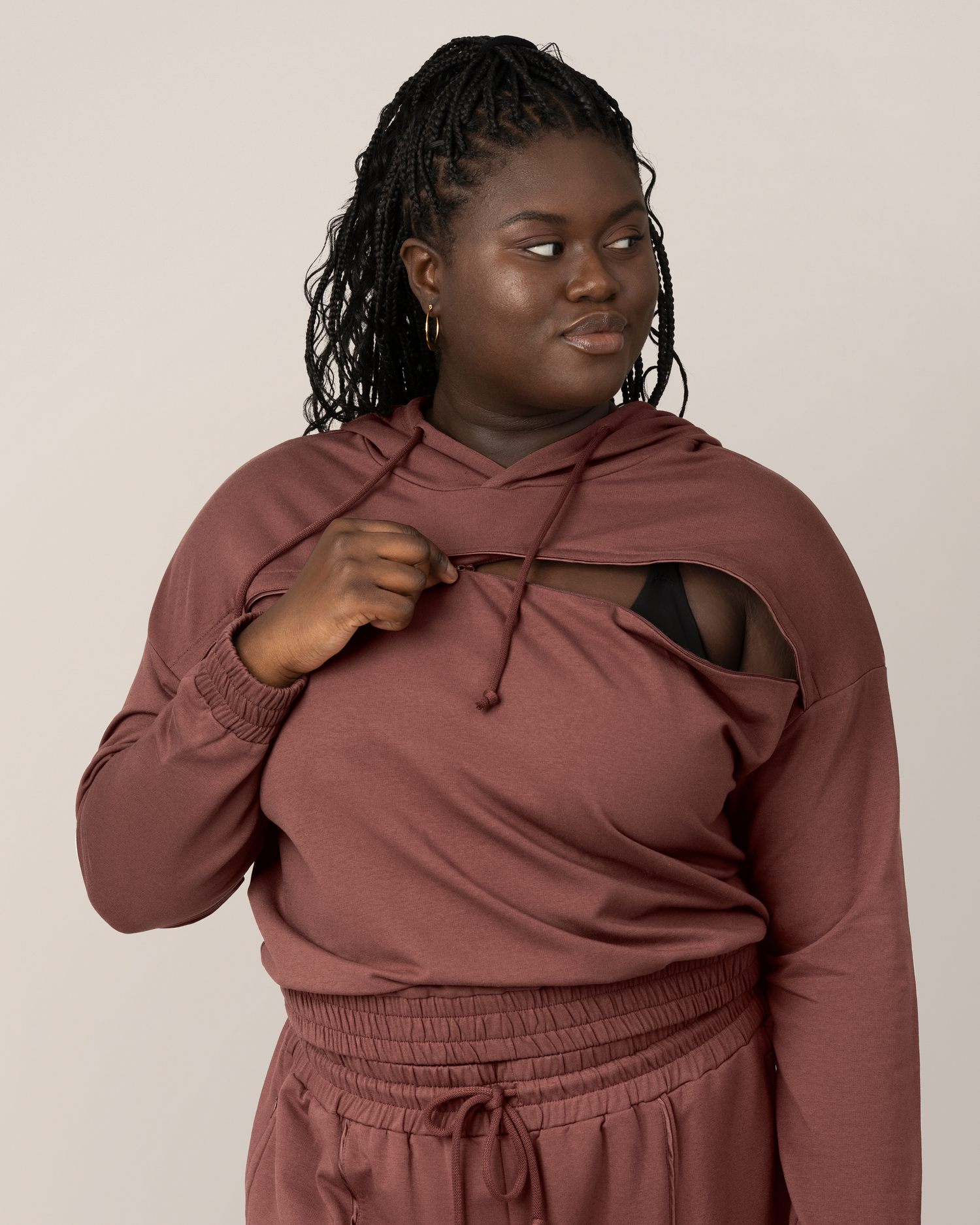 Model showing nursing access on the Mila Cropped Nursing Hoodie in Redwood