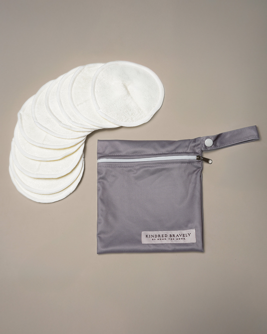 Flat lay of the Organic Bamboo Reusable Nursing Pads against an off white background. 