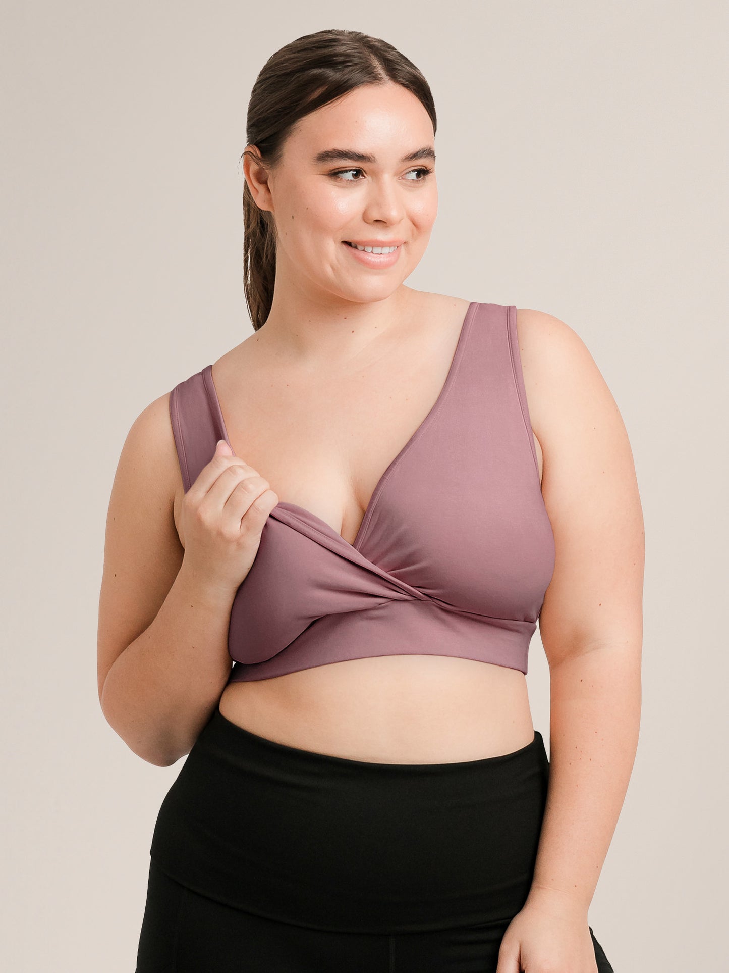 Model wearing the Organic Cotton Sleep & Nursing Bra in Twilight, showing nursing access