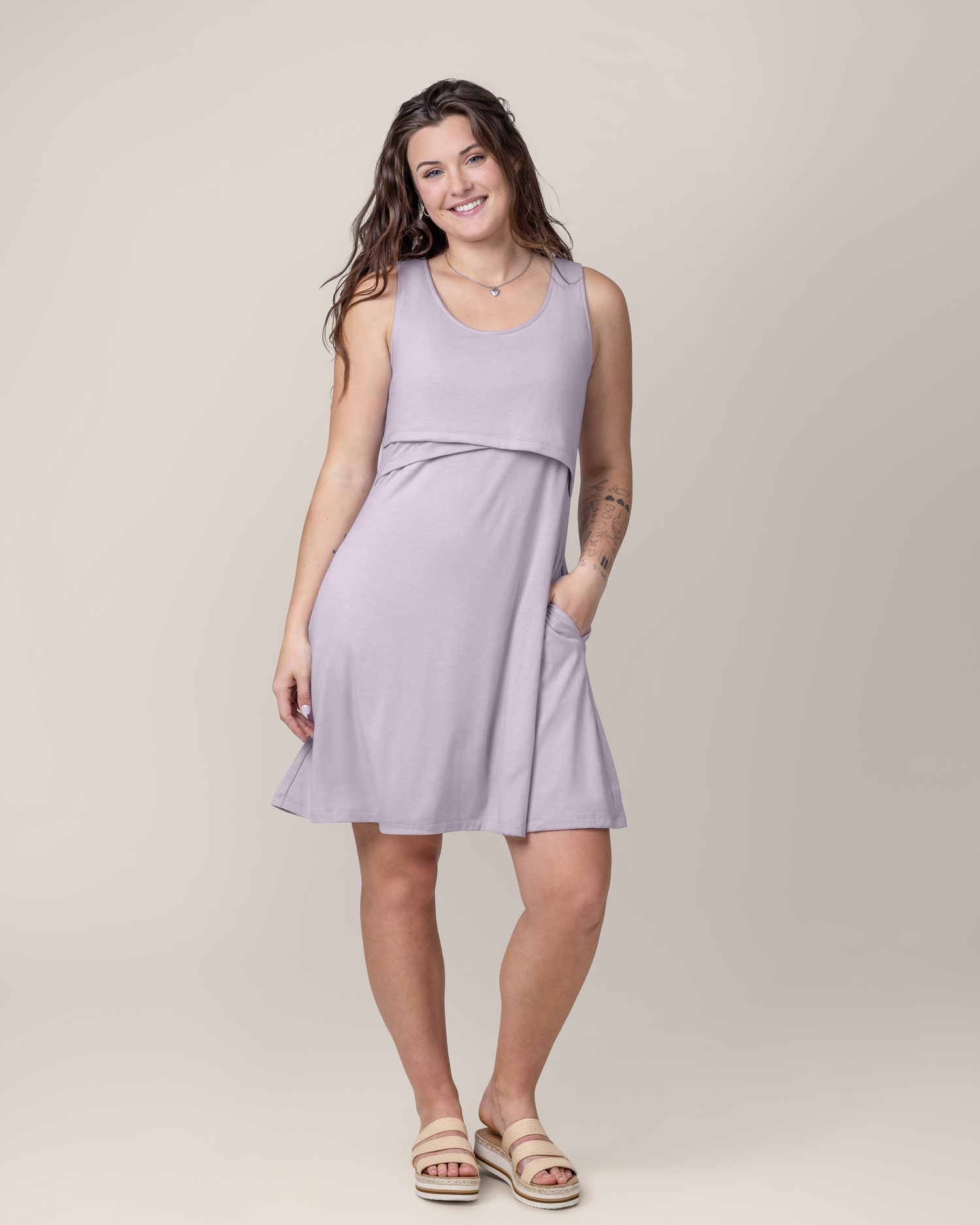 Front view of model wearing the Penelope Crossover Nursing Dress in Lavender Mist @model_info:Megan is 5'7" and wearing a Small.@model_info:Gibson is 5'9" and wearing a Medium.